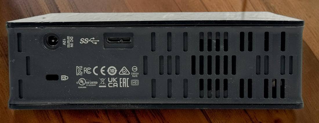 WD Easystore 14TB external hard drive, tested and working. USB desktop storage unit. Power adapter and USB cable not included. Used condition.