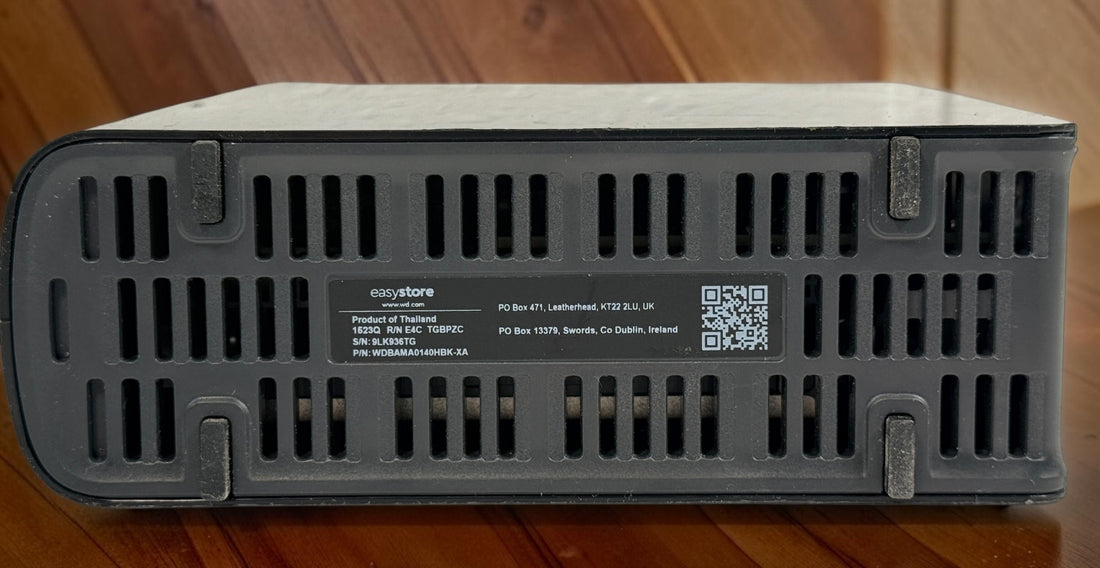 WD Easystore 14TB external hard drive, tested and working. USB desktop storage unit. Power adapter and USB cable not included. Used condition.
