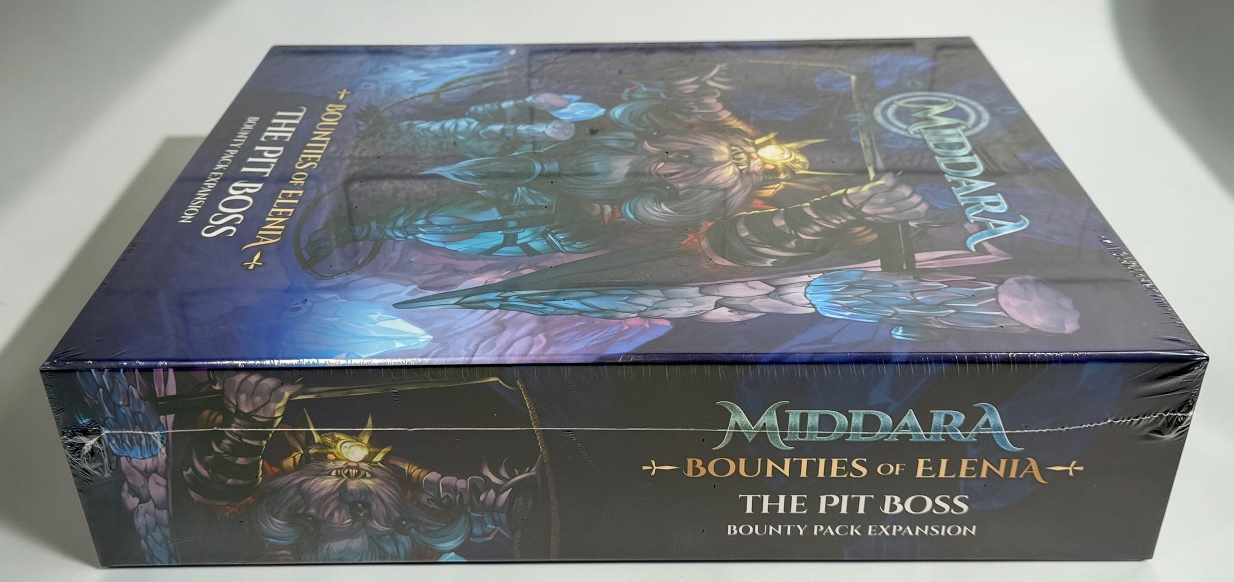 Factory-sealed Middara The Pit Boss Bounties of Elenia expansion by Succubus Publishing, with 15 miniatures, cards and tokens. New and sealed.