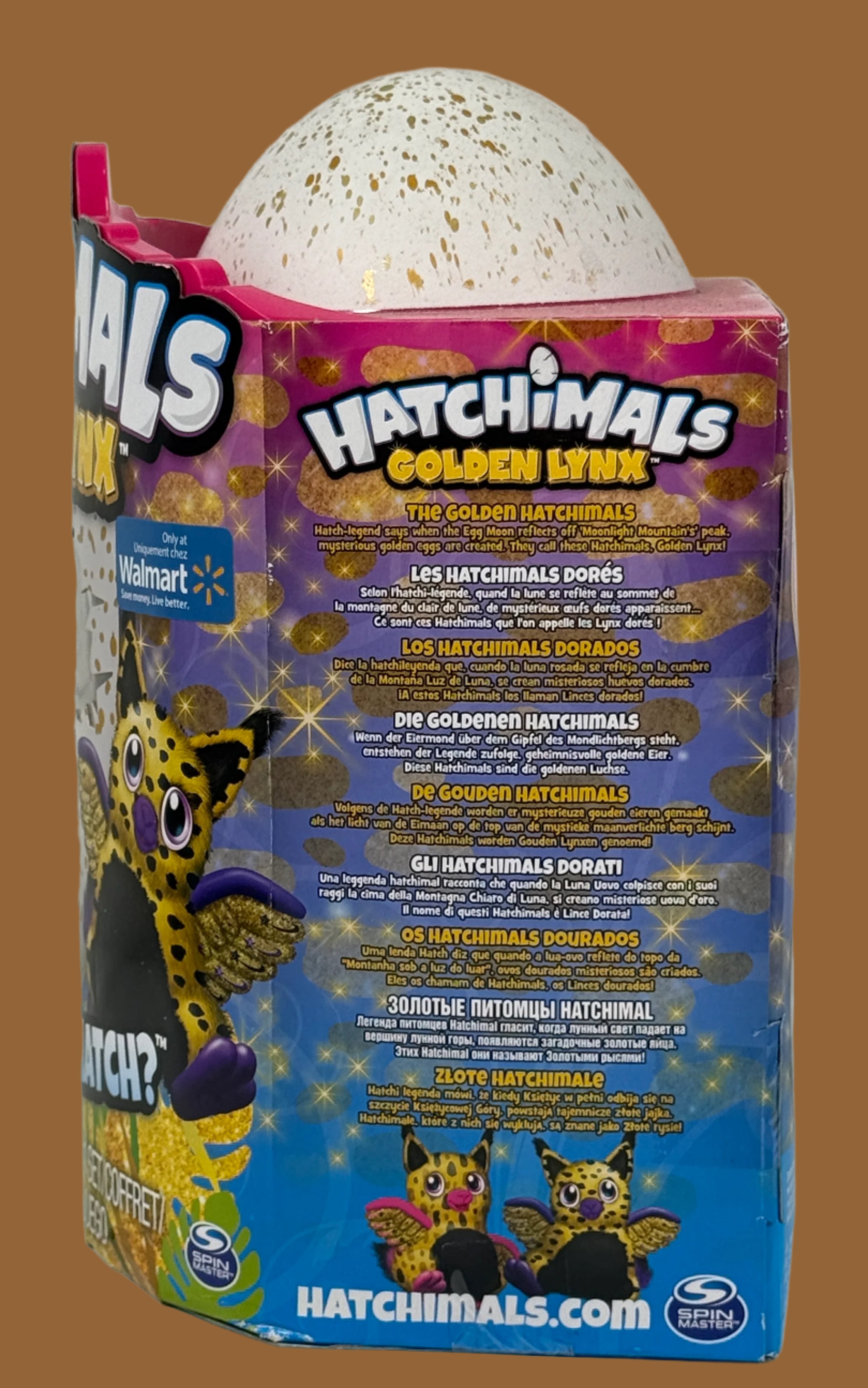 Hatchimals Golden Lynx toy packaging with character illustration and product details.