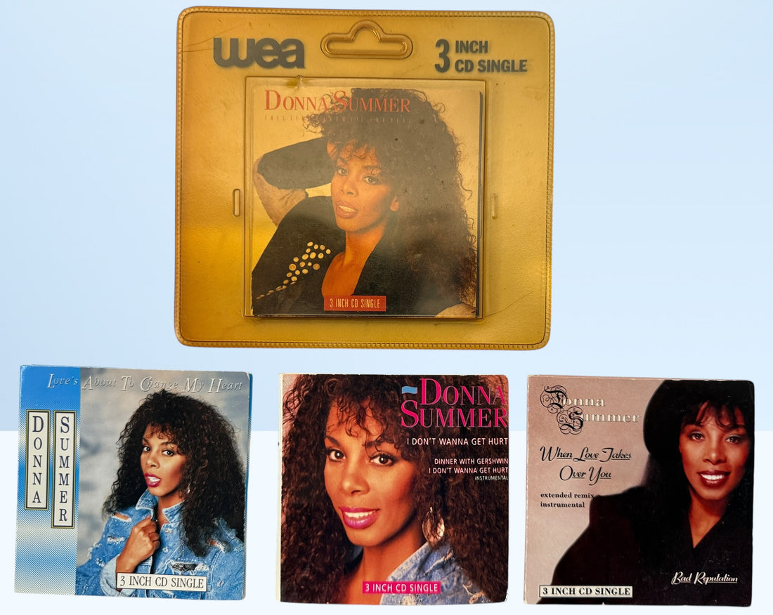 Vintage Donna Summer 3-inch CD singles lot, late 1980s WEA Germany pressings including one sealed copy. Collectible mini CD pop format set.
