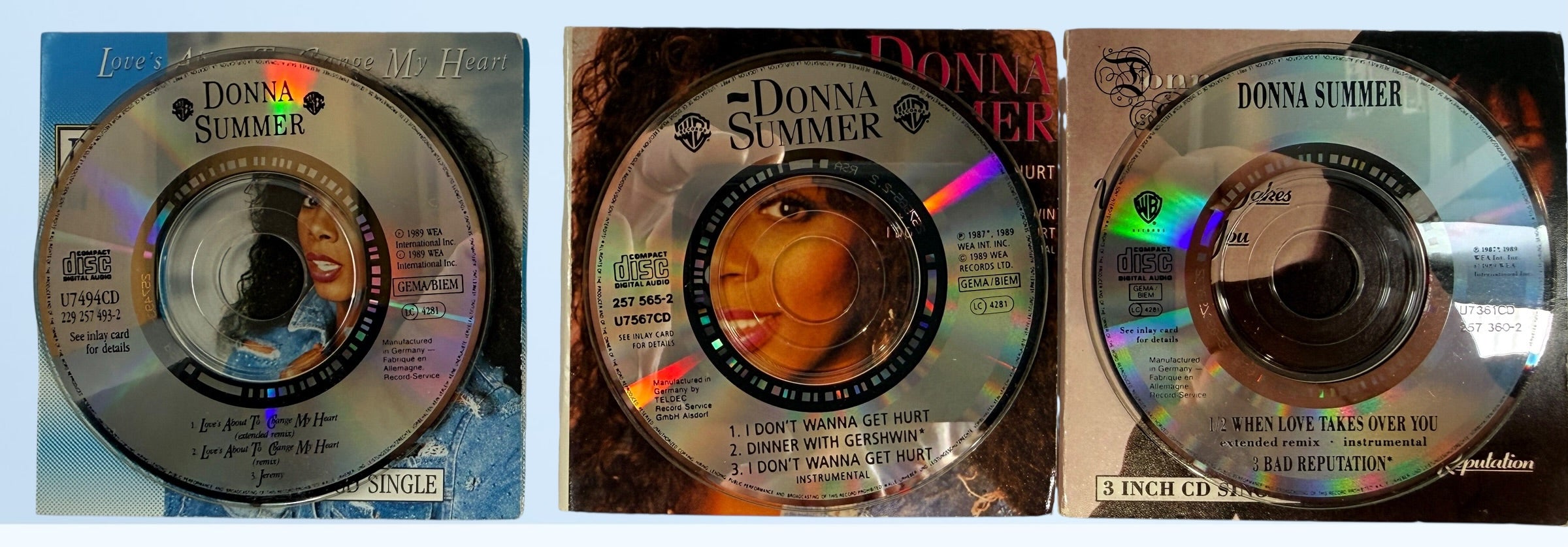 Vintage Donna Summer 3-inch CD singles lot, late 1980s WEA Germany pressings including one sealed copy. Collectible mini CD pop format set.