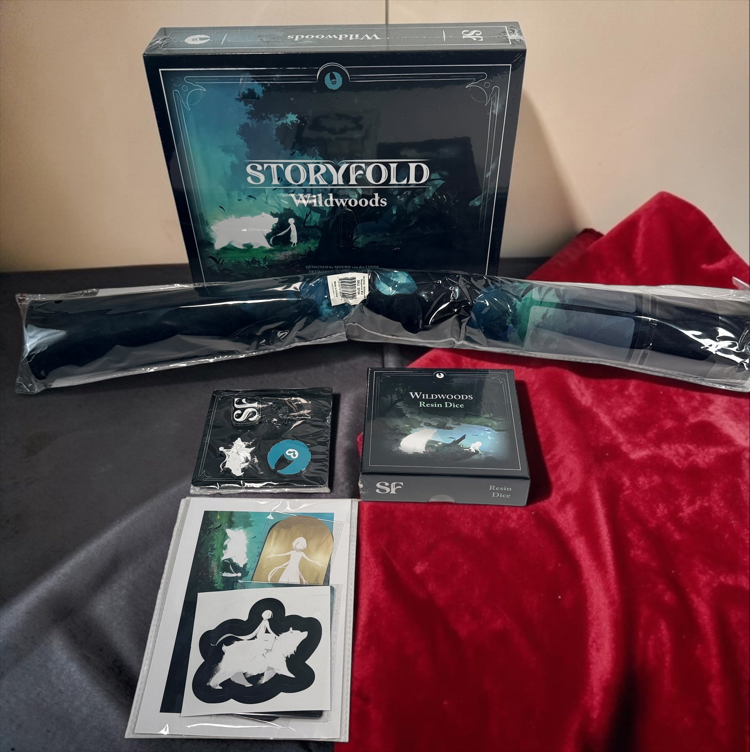 Storyfold: Wildwoods sealed solo board game bundle with resin dice, neoprene playmat, enamel pins and Kickstarter Exclusive Pack by Open Owl Studios.