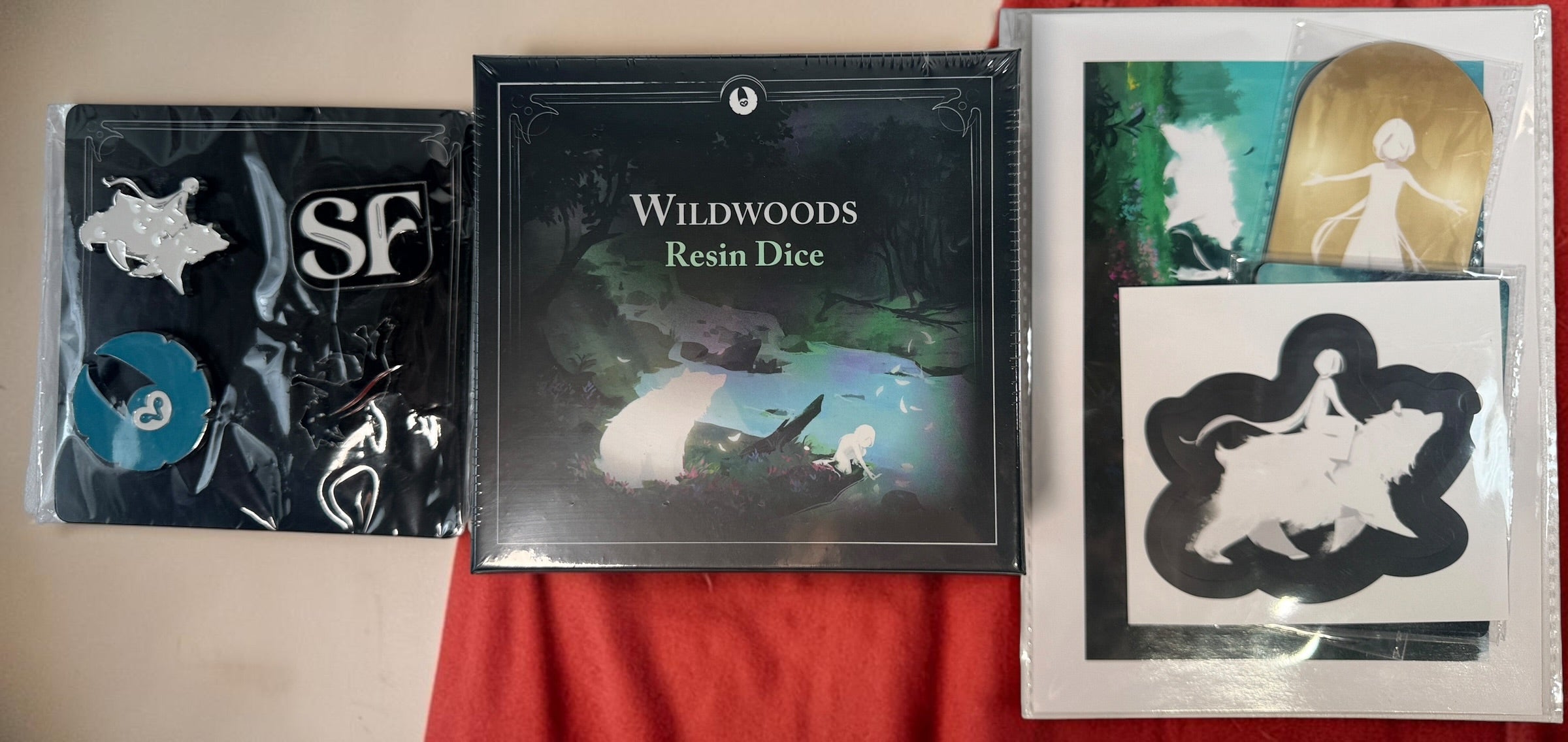 Storyfold: Wildwoods sealed solo board game bundle with resin dice, neoprene playmat, enamel pins and Kickstarter Exclusive Pack by Open Owl Studios.