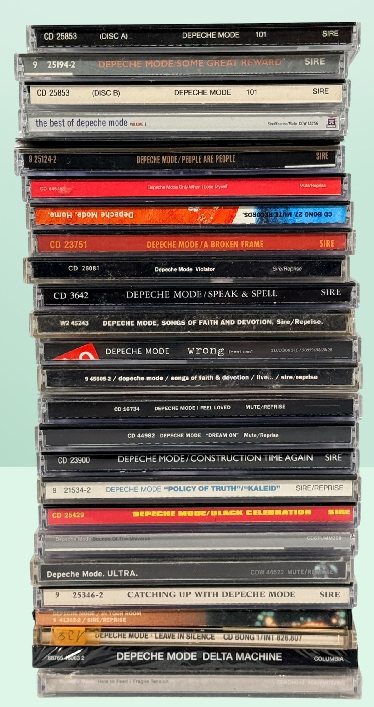 Large Depeche Mode CD lot with 28 discs including Violator, Black Celebration, 101, singles, remixes, and sealed copies. Complete fan collection bundle.