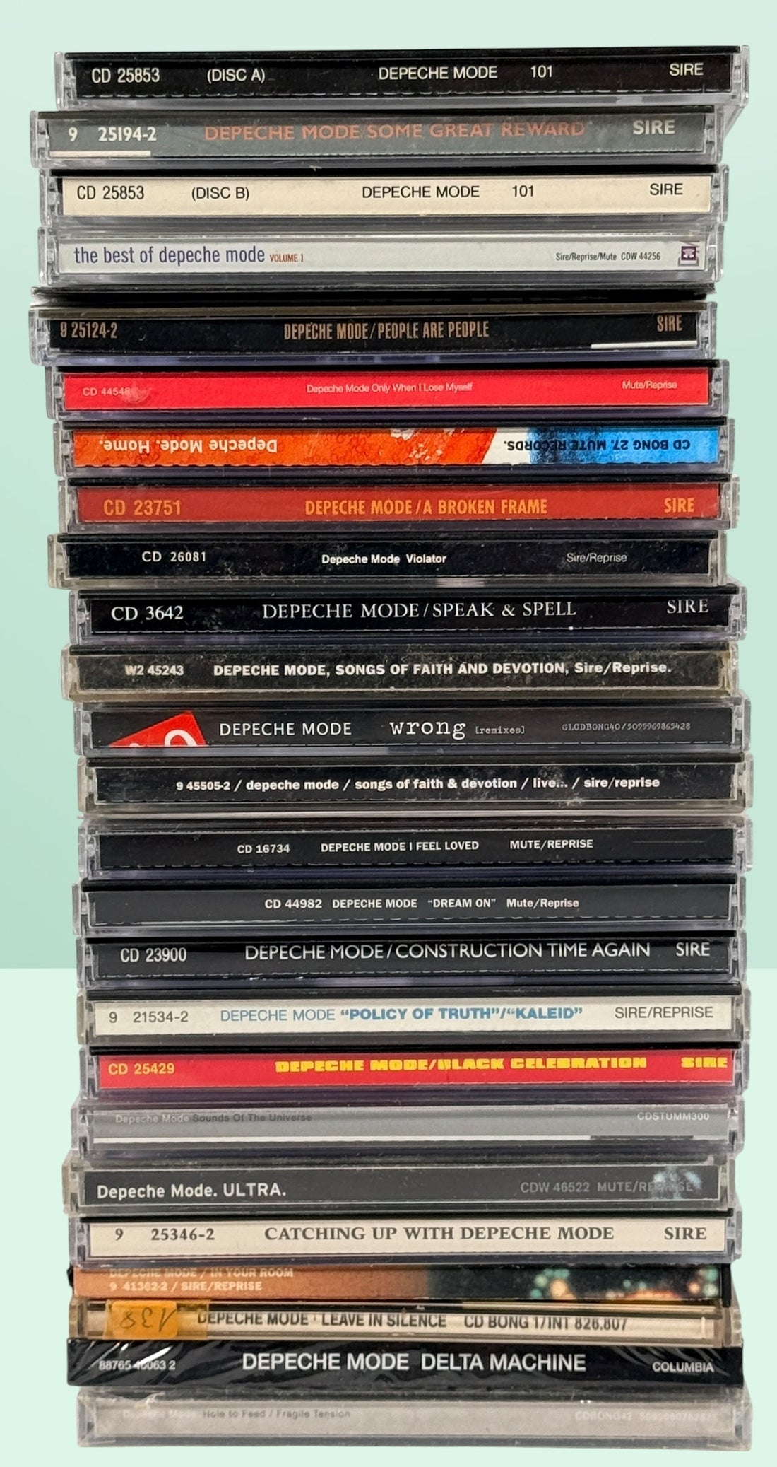 Large Depeche Mode CD lot with 28 discs including Violator, Black Celebration, 101, singles, remixes, and sealed copies. Complete fan collection bundle.