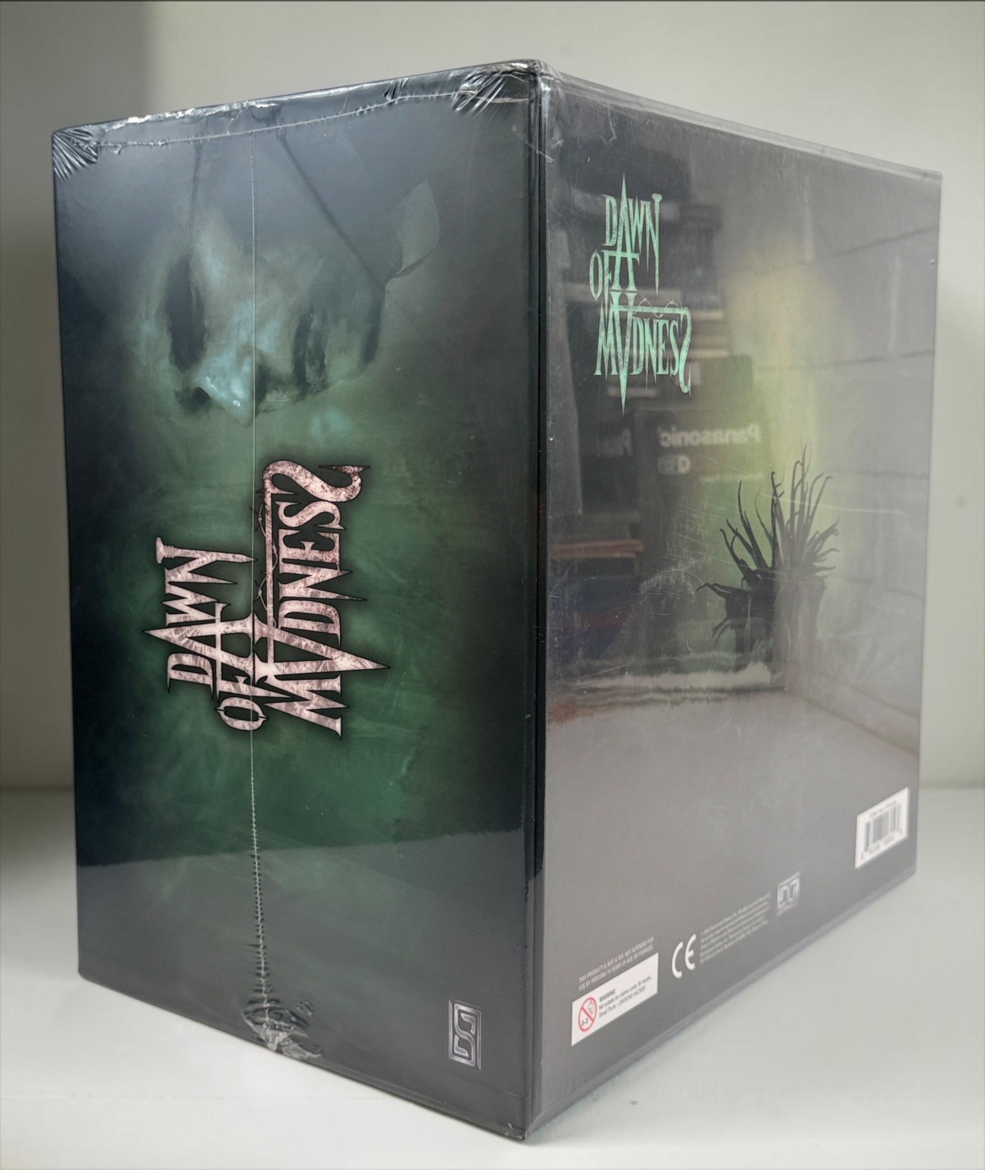 Dawn of Madness DOM01 core board game by Diemension Games. Factory sealed 2023 edition with original packaging. Dark narrative horror adventure.