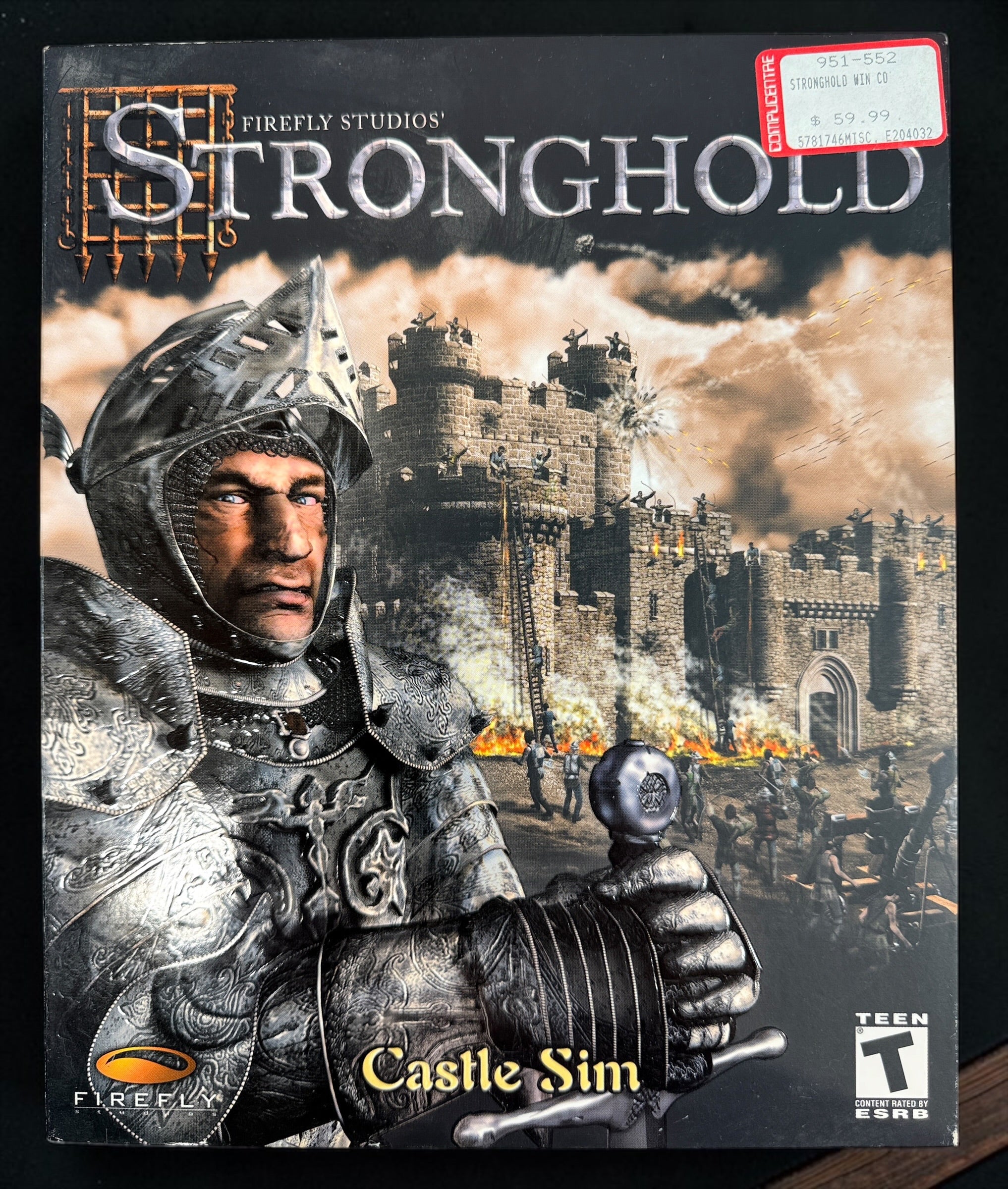 Stronghold PC 2001 original Firefly Studios big-box edition with CD-ROM and manual. Classic medieval castle-building strategy game.