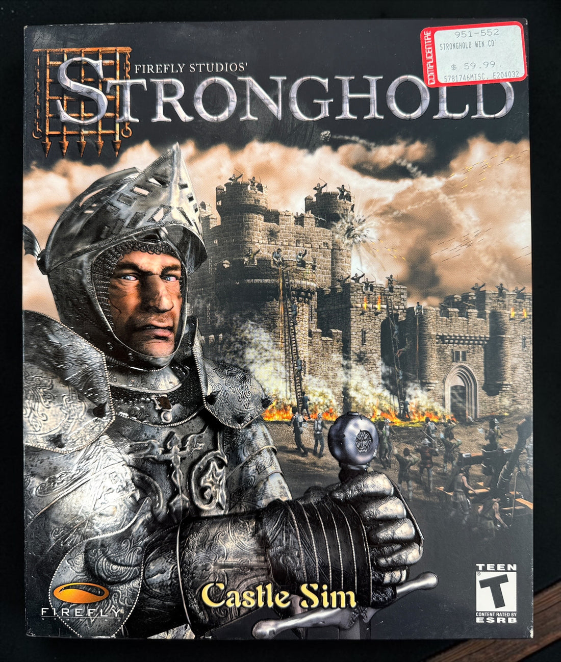 Stronghold PC 2001 original Firefly Studios big-box edition with CD-ROM and manual. Classic medieval castle-building strategy game.