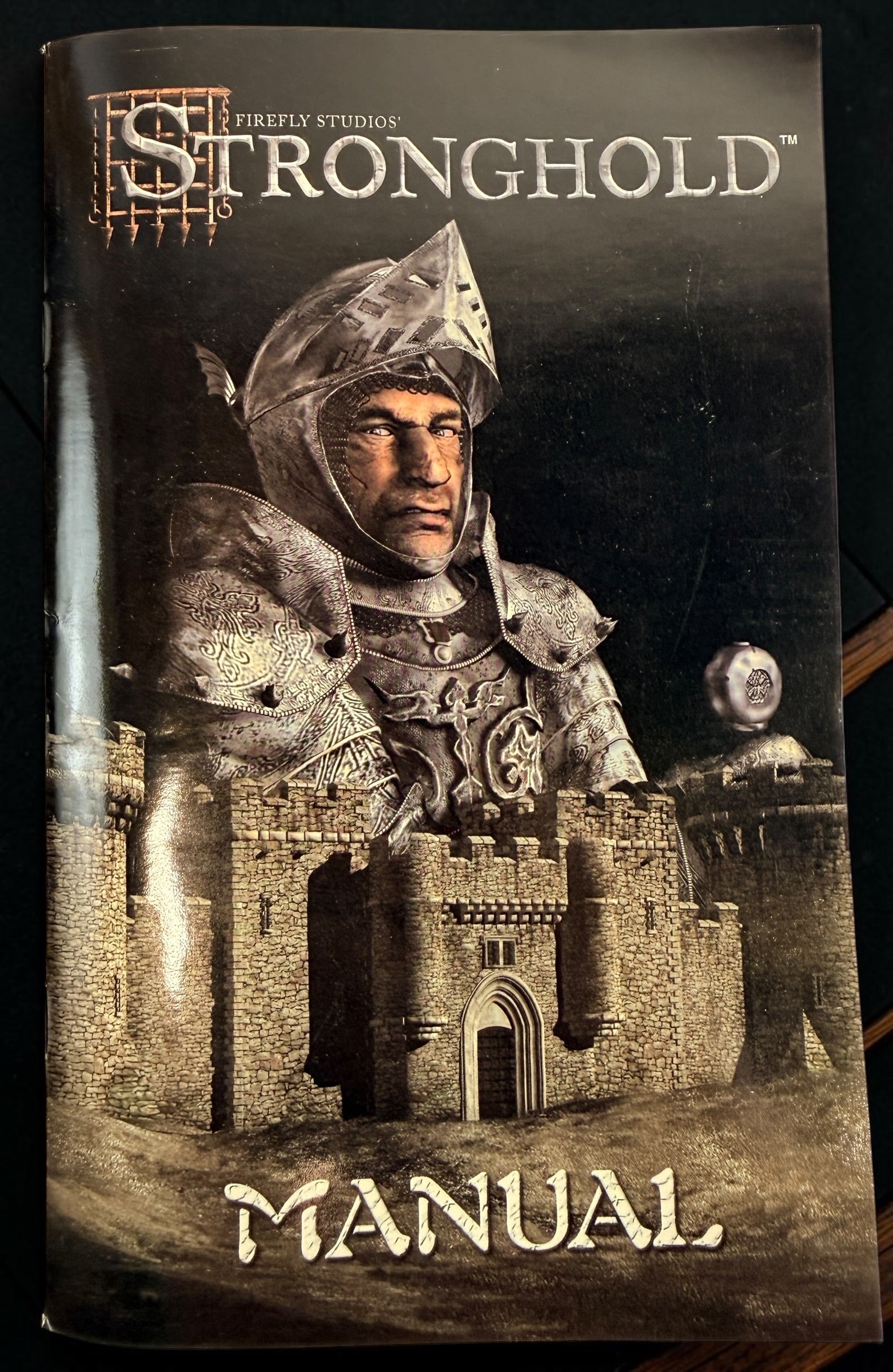 Stronghold PC 2001 original Firefly Studios big-box edition with CD-ROM and manual. Classic medieval castle-building strategy game.
