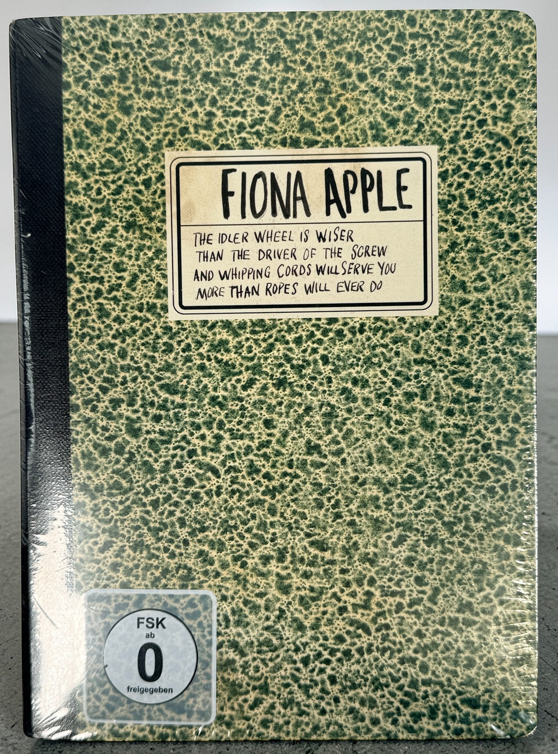 Sealed Fiona Apple The Idler Wheel deluxe CD DVD 2012 hardbound edition with live SXSW footage. Collectible alternative art pop release in book format.
