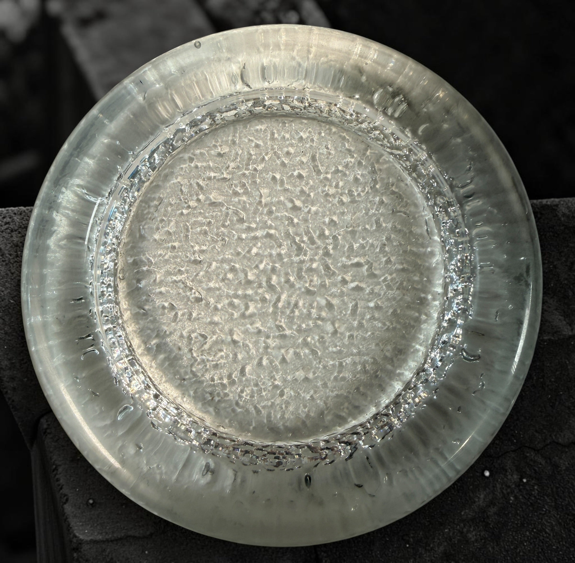 Vintage Iittala Visa clear glass ashtray designed by Timo Sarpaneva in Finland. Sculptural Scandinavian modern art glass with ice-textured finish.