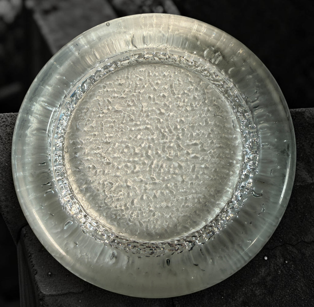 Vintage Iittala Visa clear glass ashtray designed by Timo Sarpaneva in Finland. Sculptural Scandinavian modern art glass with ice-textured finish.