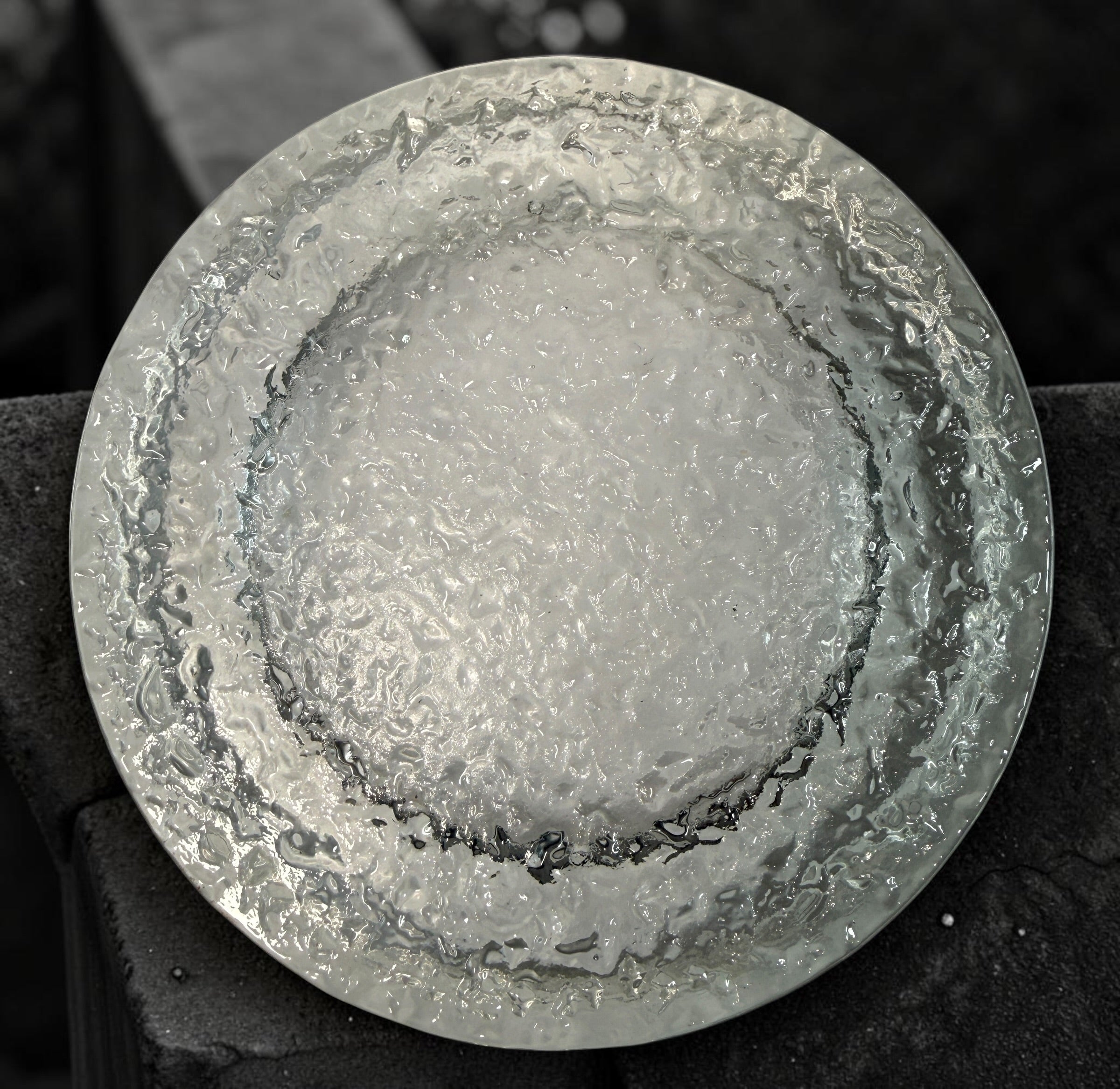 Vintage Iittala Visa clear glass ashtray designed by Timo Sarpaneva in Finland. Sculptural Scandinavian modern art glass with ice-textured finish.