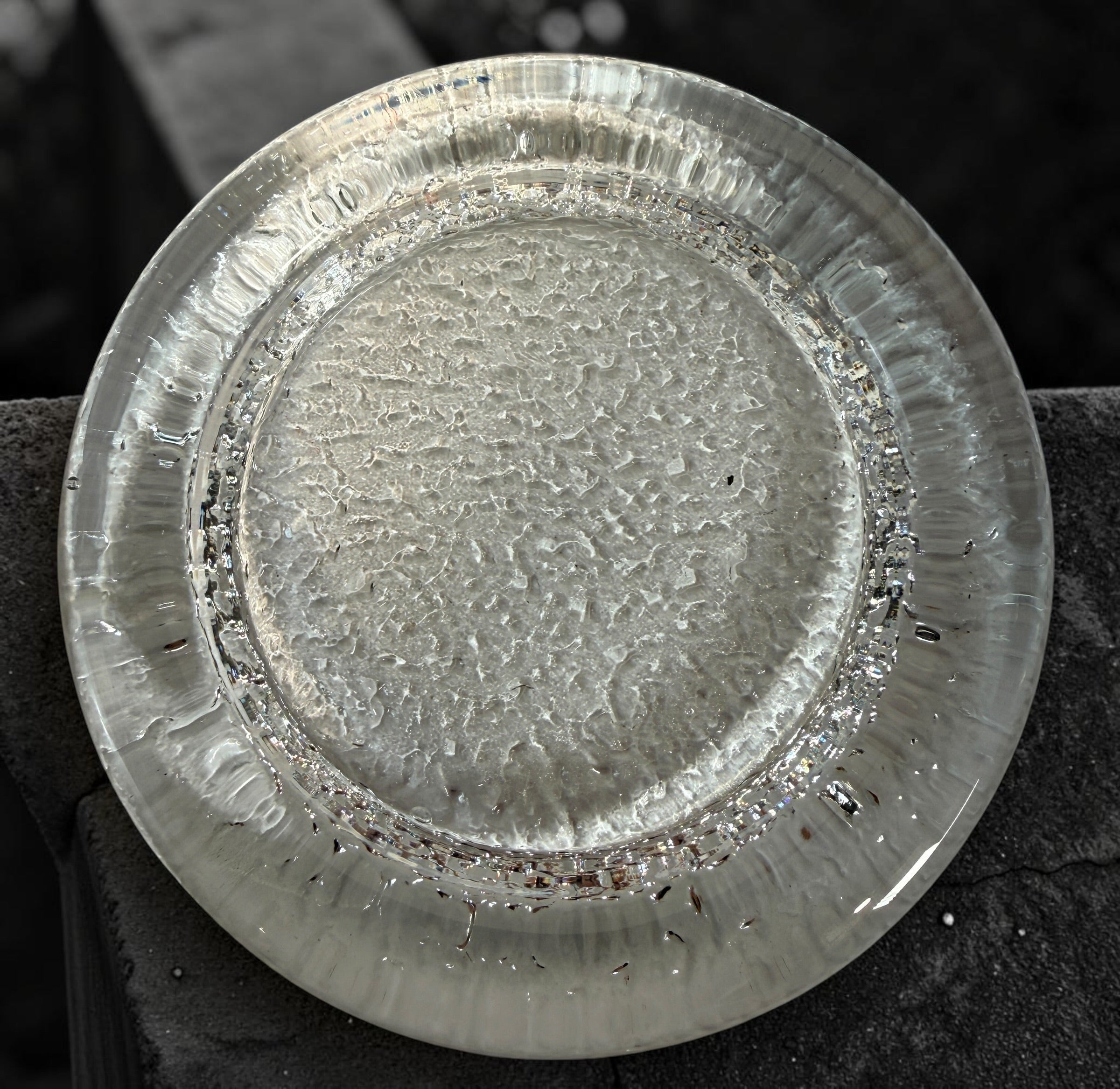 Vintage Iittala Visa clear glass ashtray designed by Timo Sarpaneva in Finland. Sculptural Scandinavian modern art glass with ice-textured finish.