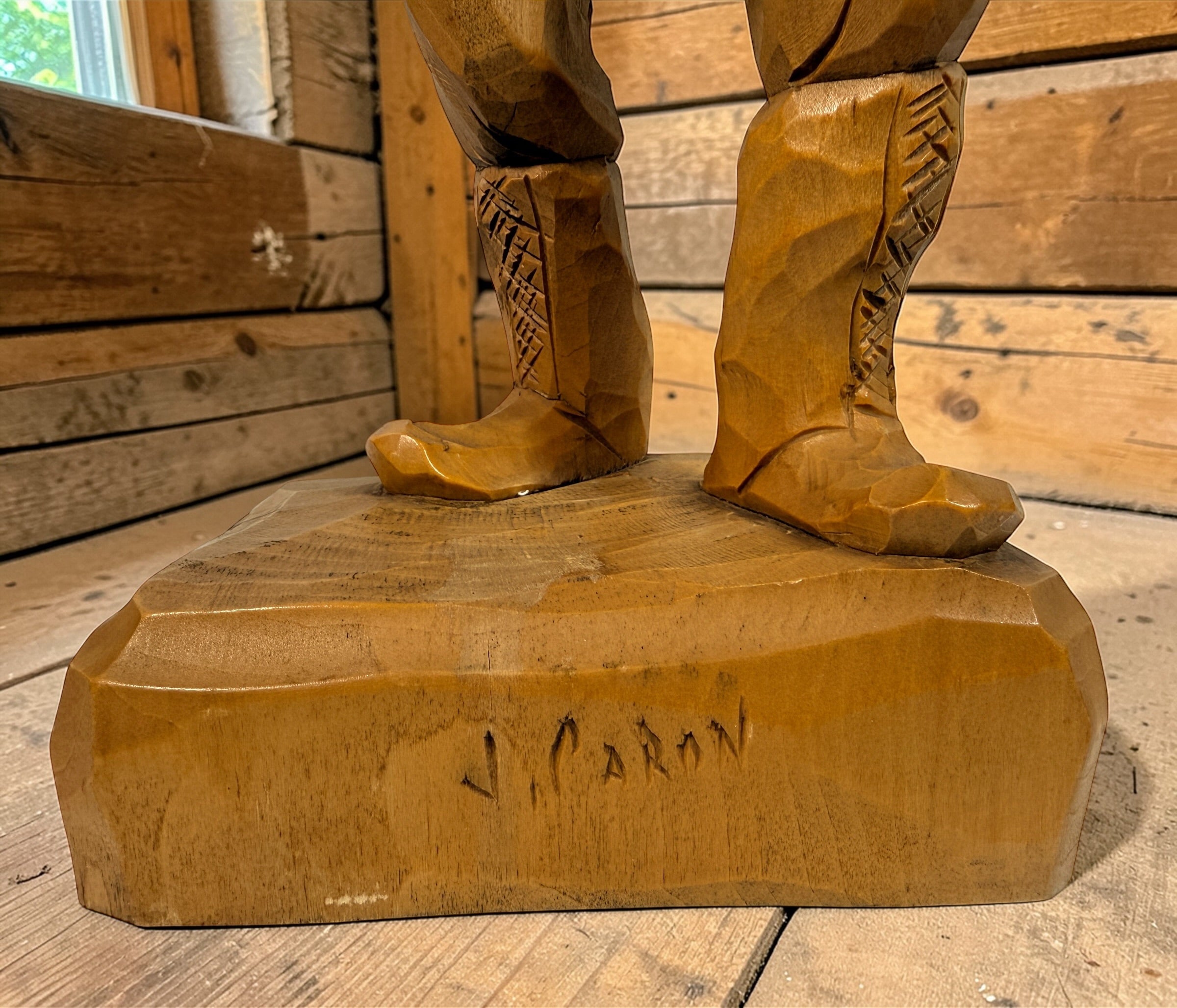 Mid-century Quebec folk art wood carving signed J. Caron, hand-carved habitant figure with rustic character, vintage Canadian decorative sculpture collectible.
