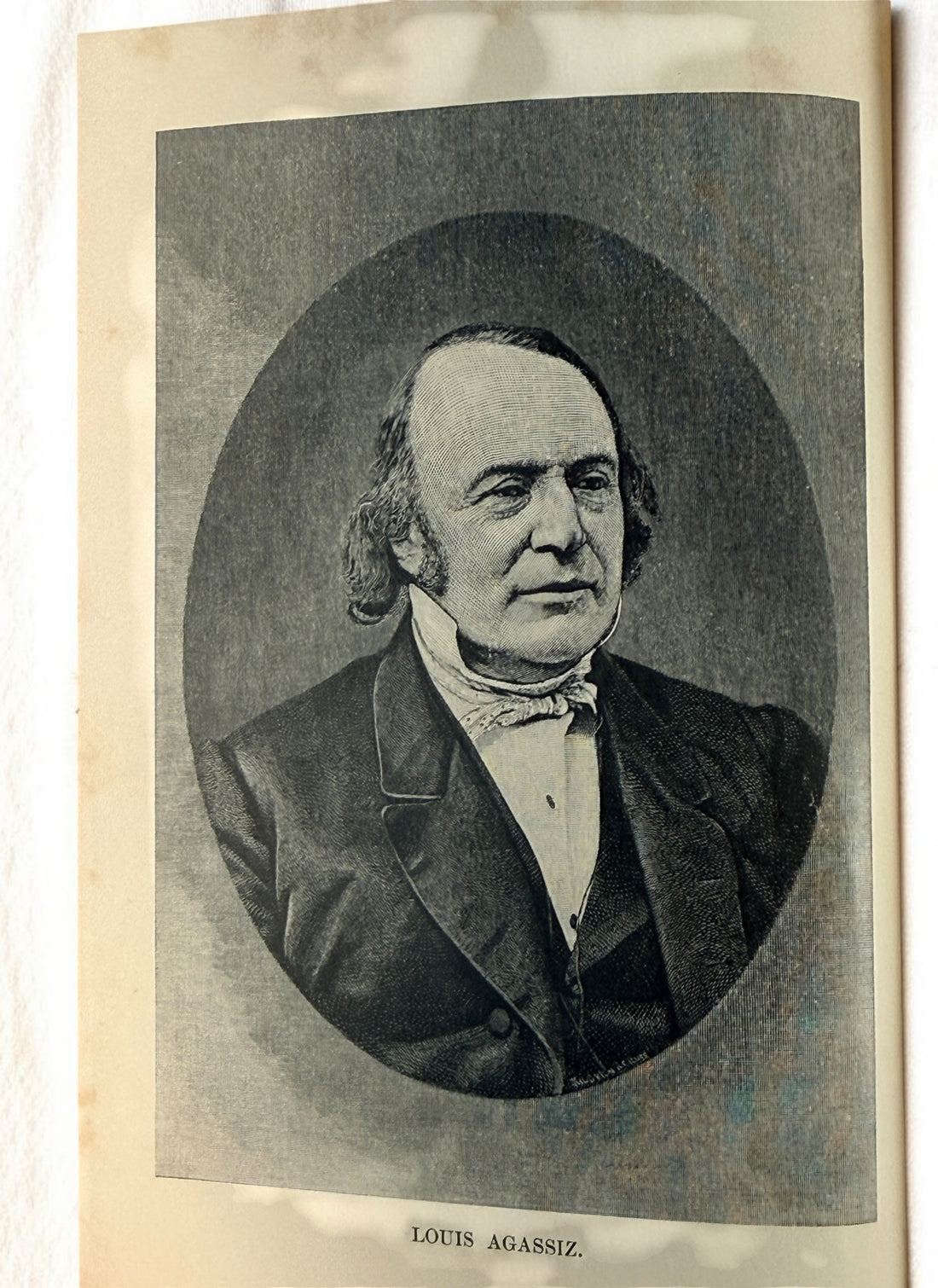 1889 first edition of Famous Men of Science by Sarah K. Bolton, illustrated antique hardcover with decorative blue cloth and gilt binding.