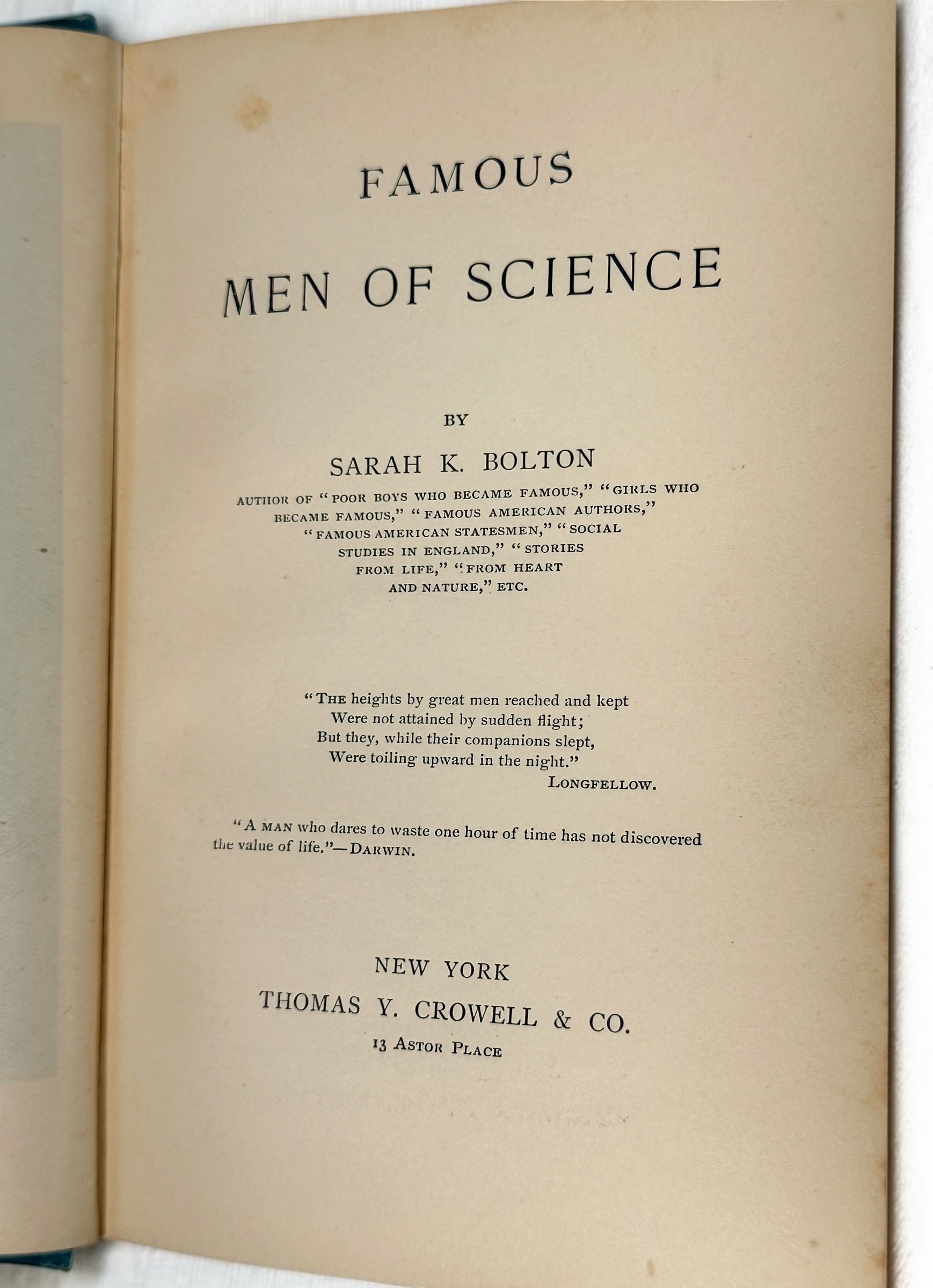 1889 first edition of Famous Men of Science by Sarah K. Bolton, illustrated antique hardcover with decorative blue cloth and gilt binding.