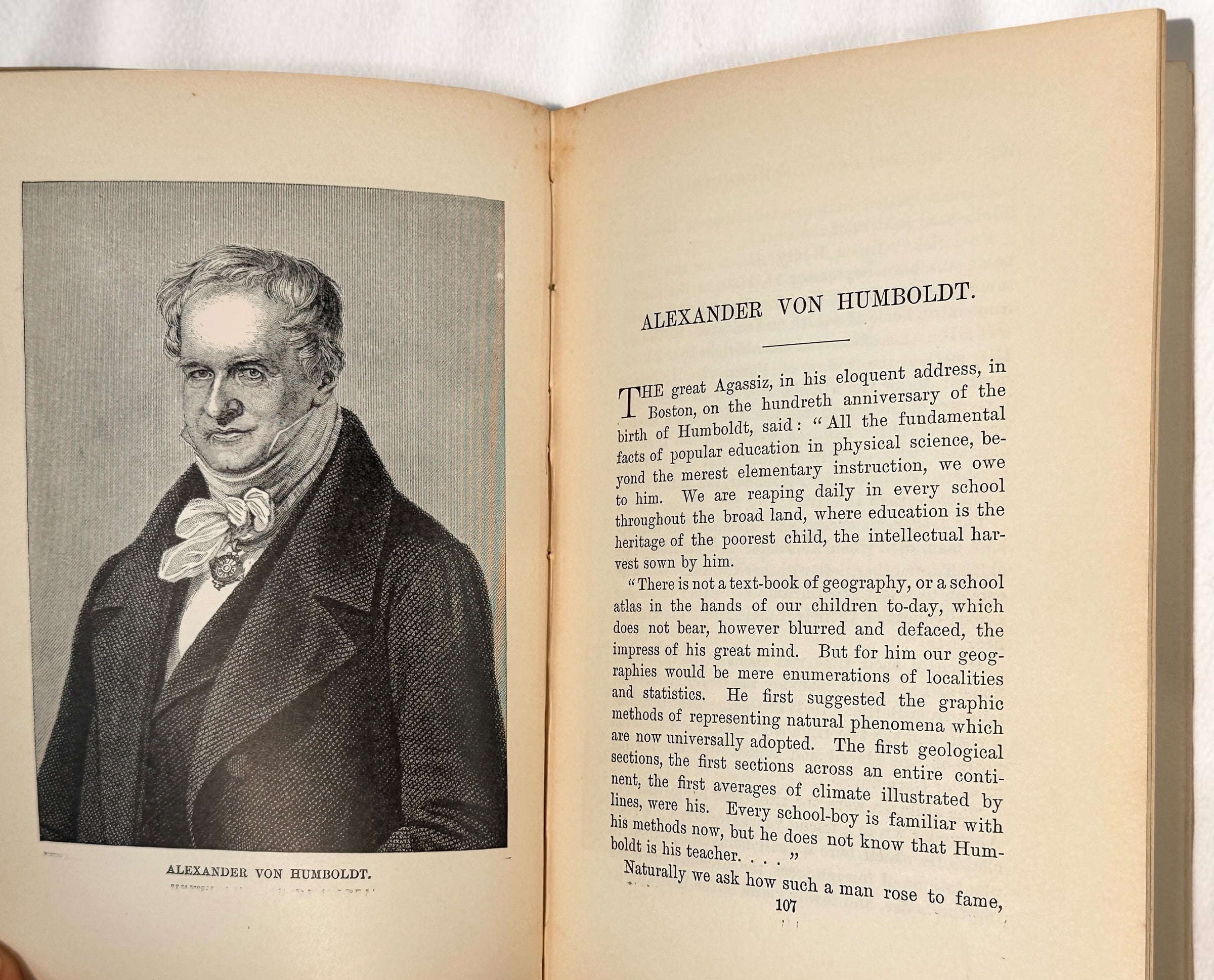1889 first edition of Famous Men of Science by Sarah K. Bolton, illustrated antique hardcover with decorative blue cloth and gilt binding.