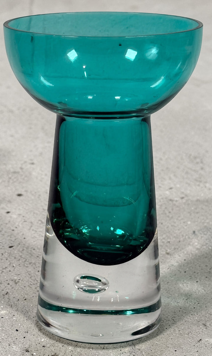 Mid century modern teal art glass pedestal bowl with heavy clear base. Scandinavian style decorative centerpiece perfect for modern or vintage interiors.