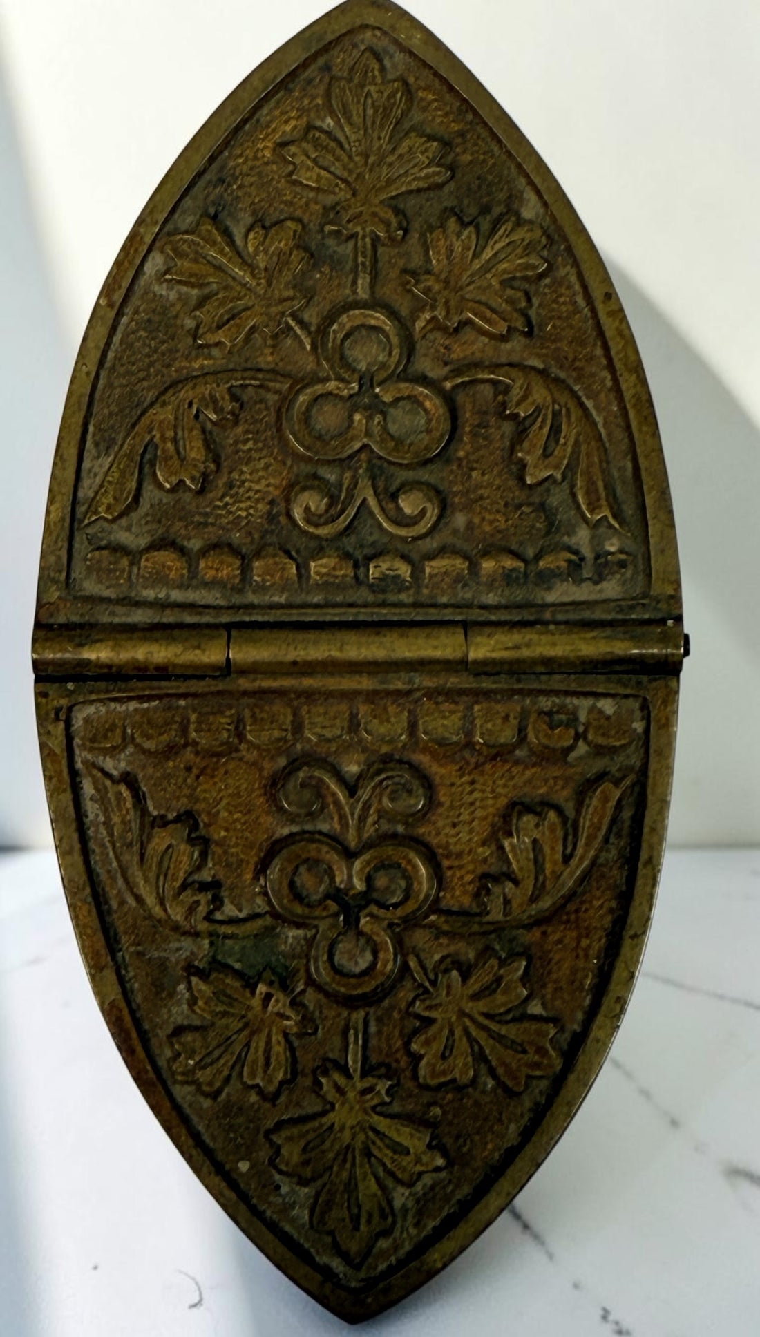 Antique brass liturgical incense boat/navicula with hinged lids, pedestal base and embossed grapevine decoration. Ecclesiastical religious collectible.