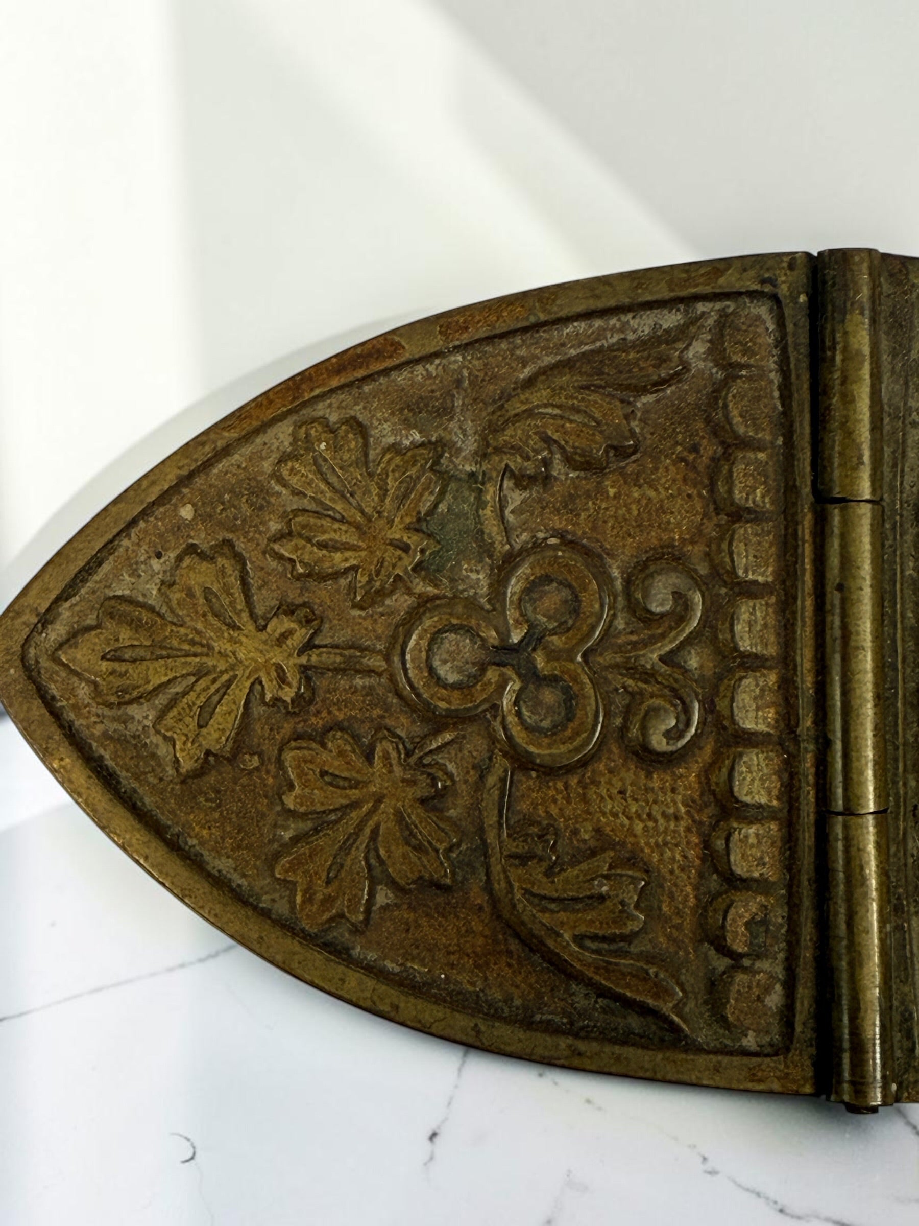 Antique brass liturgical incense boat/navicula with hinged lids, pedestal base and embossed grapevine decoration. Ecclesiastical religious collectible.