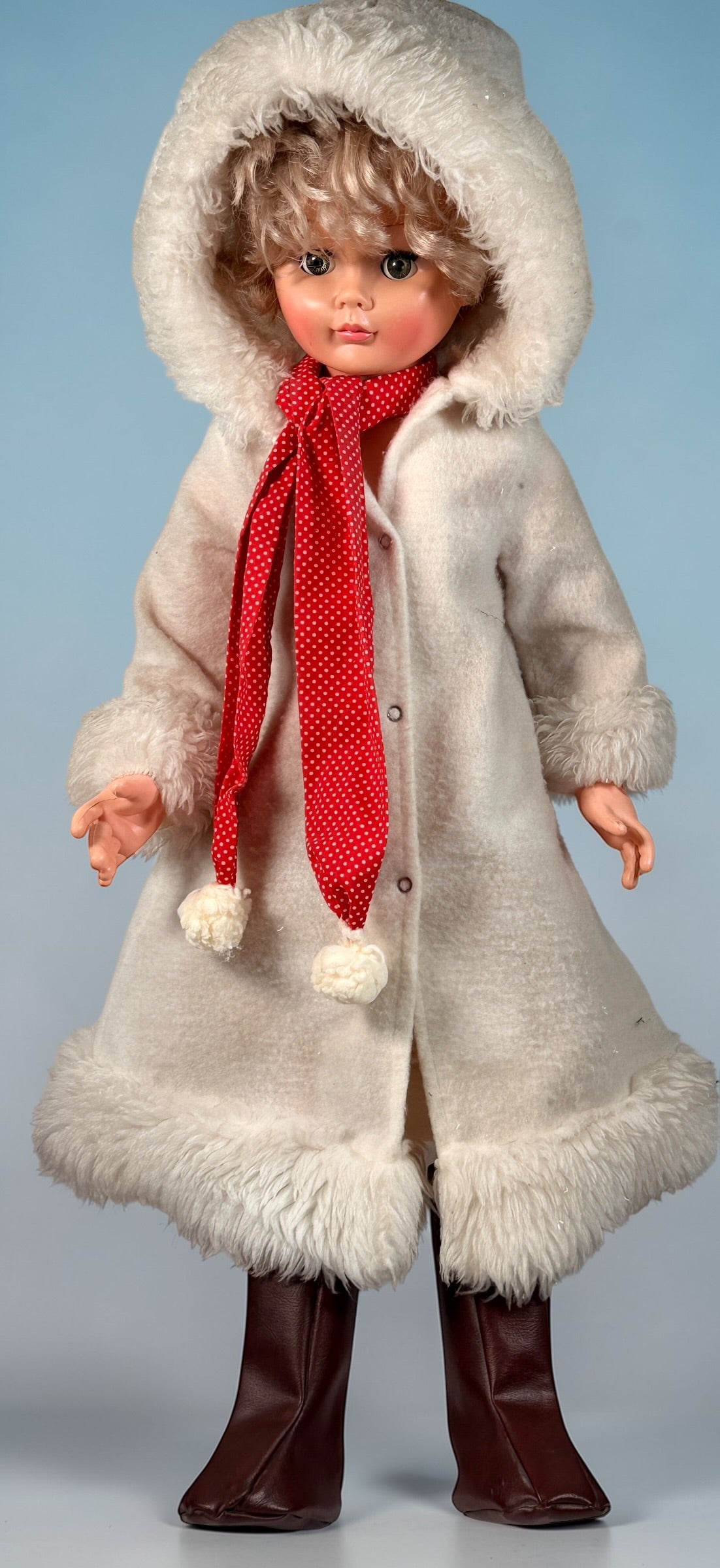 Vintage 32 inch Regal doll made in Canada, 1970s vinyl play doll with sleep eyes and rooted hair. Large nostalgic display piece in good condition.
