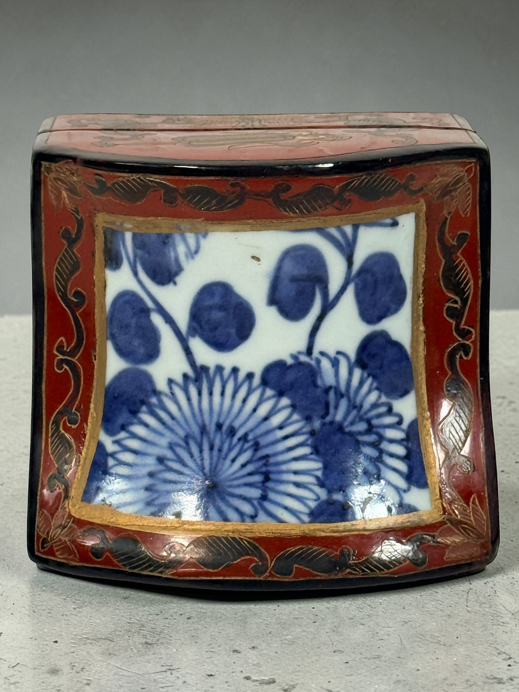 Chinese lacquer jewelry box with porcelain floral panel, red and gold decorative trinket box, vintage Asian decor storage piece, elegant display accent.