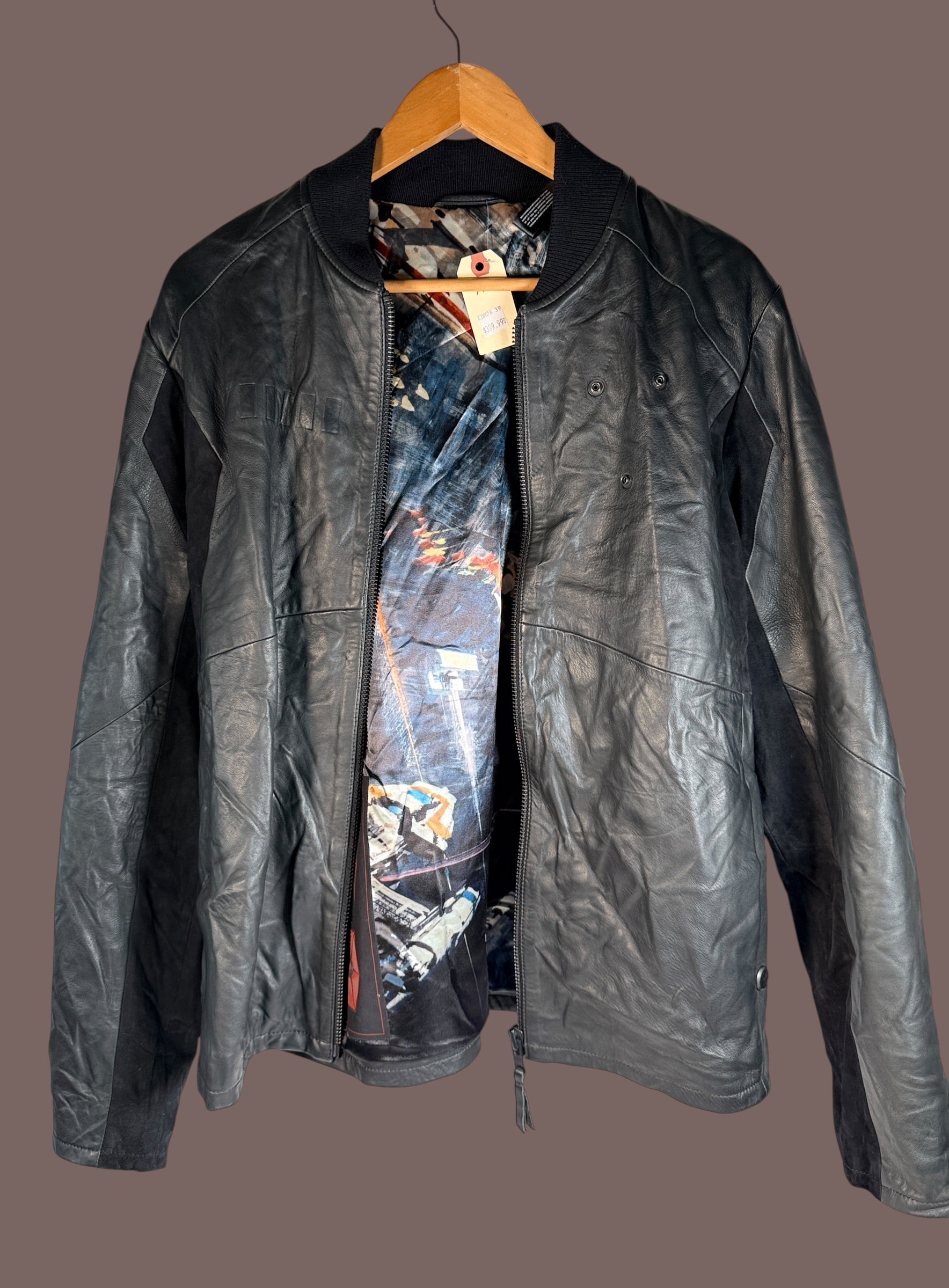 Musterbrand Star Wars TIE Pilot limited edition lamb leather jacket, size M, serialized #0033 with TIE Fighter artwork lining. Official licensed collectible.