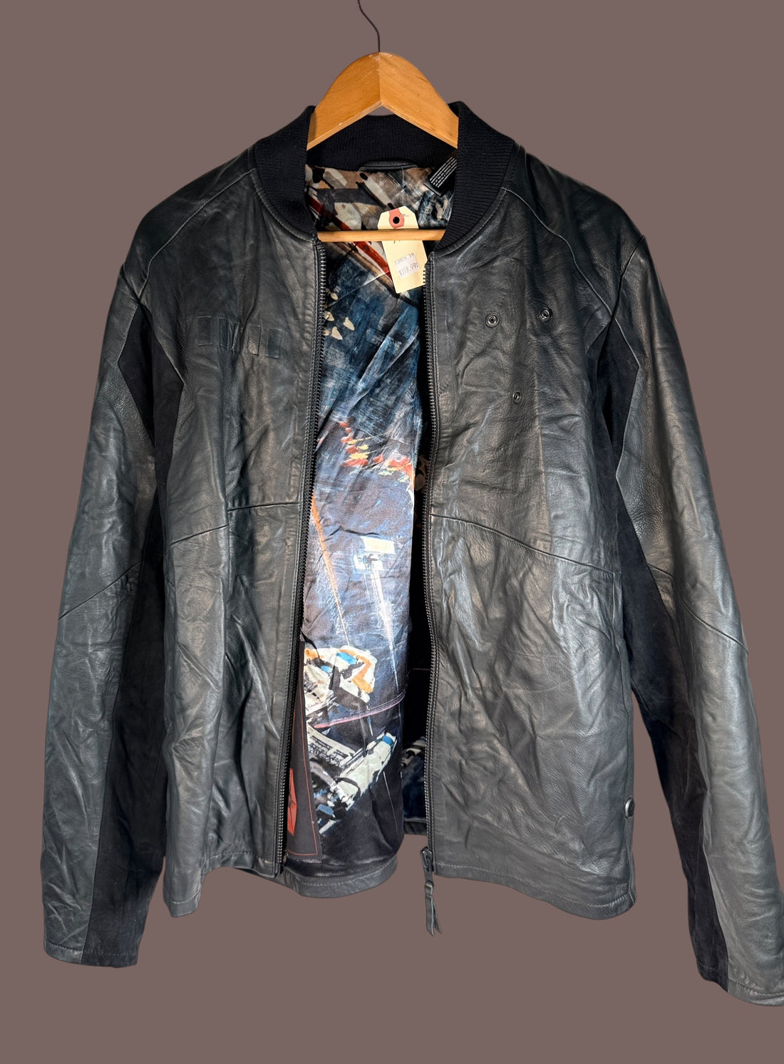 Musterbrand Star Wars TIE Pilot limited edition lamb leather jacket, size M, serialized #0033 with TIE Fighter artwork lining. Official licensed collectible.