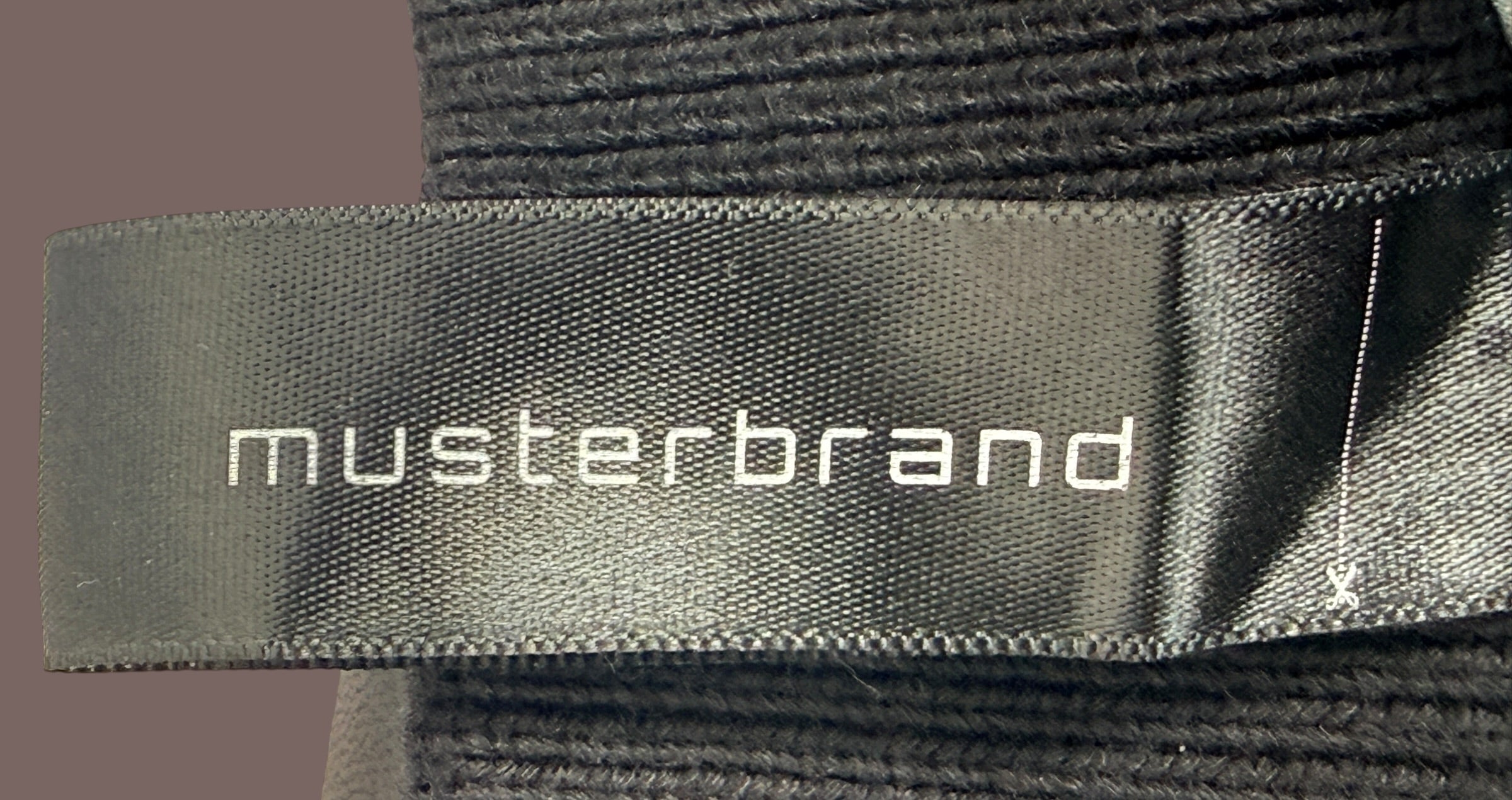Musterbrand Star Wars TIE Pilot limited edition lamb leather jacket, size M, serialized #0033 with TIE Fighter artwork lining. Official licensed collectible.