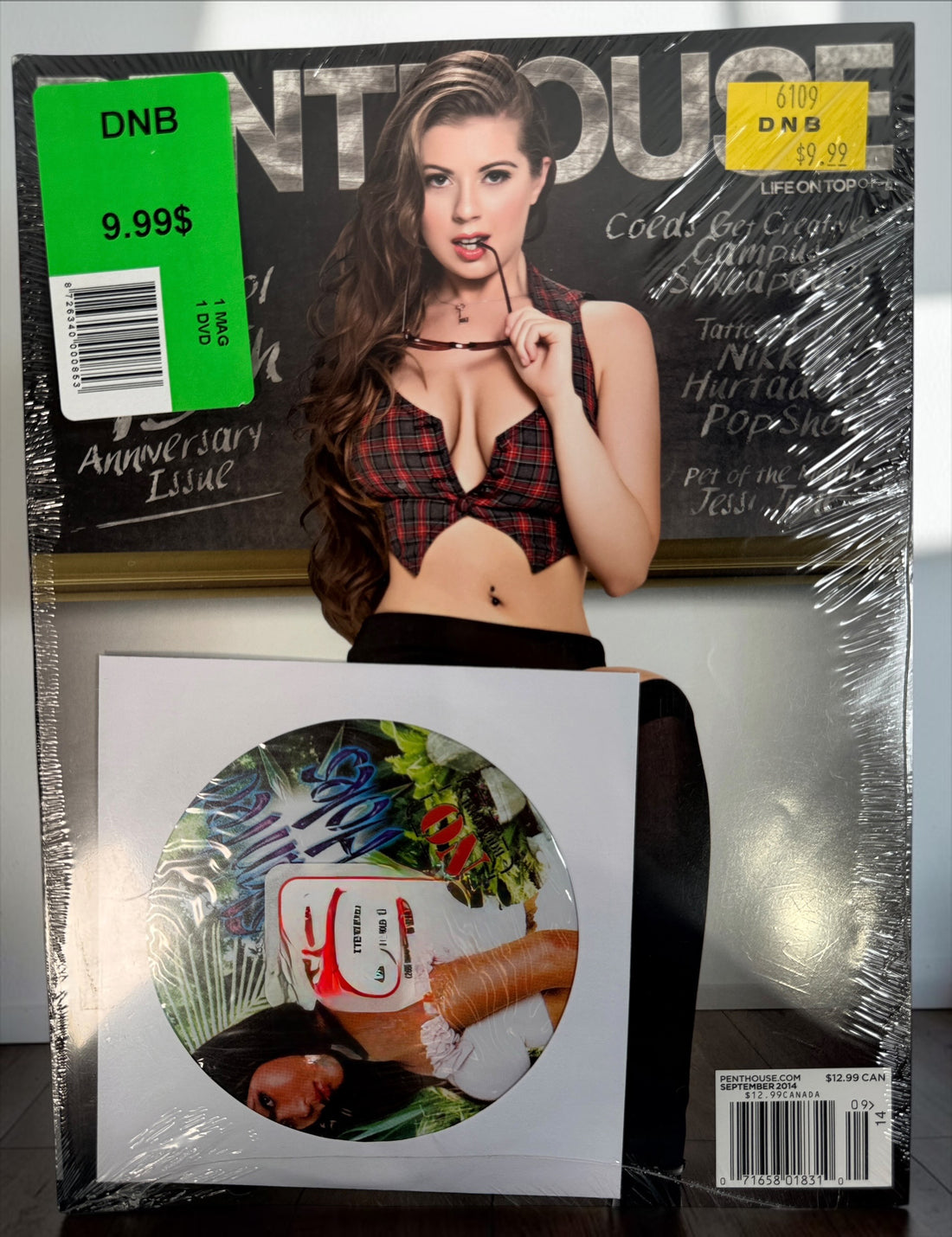 Sealed Penthouse September 2014 45th Anniversary magazine with original bonus DVD. Collectible unopened issue with original shrink wrap.