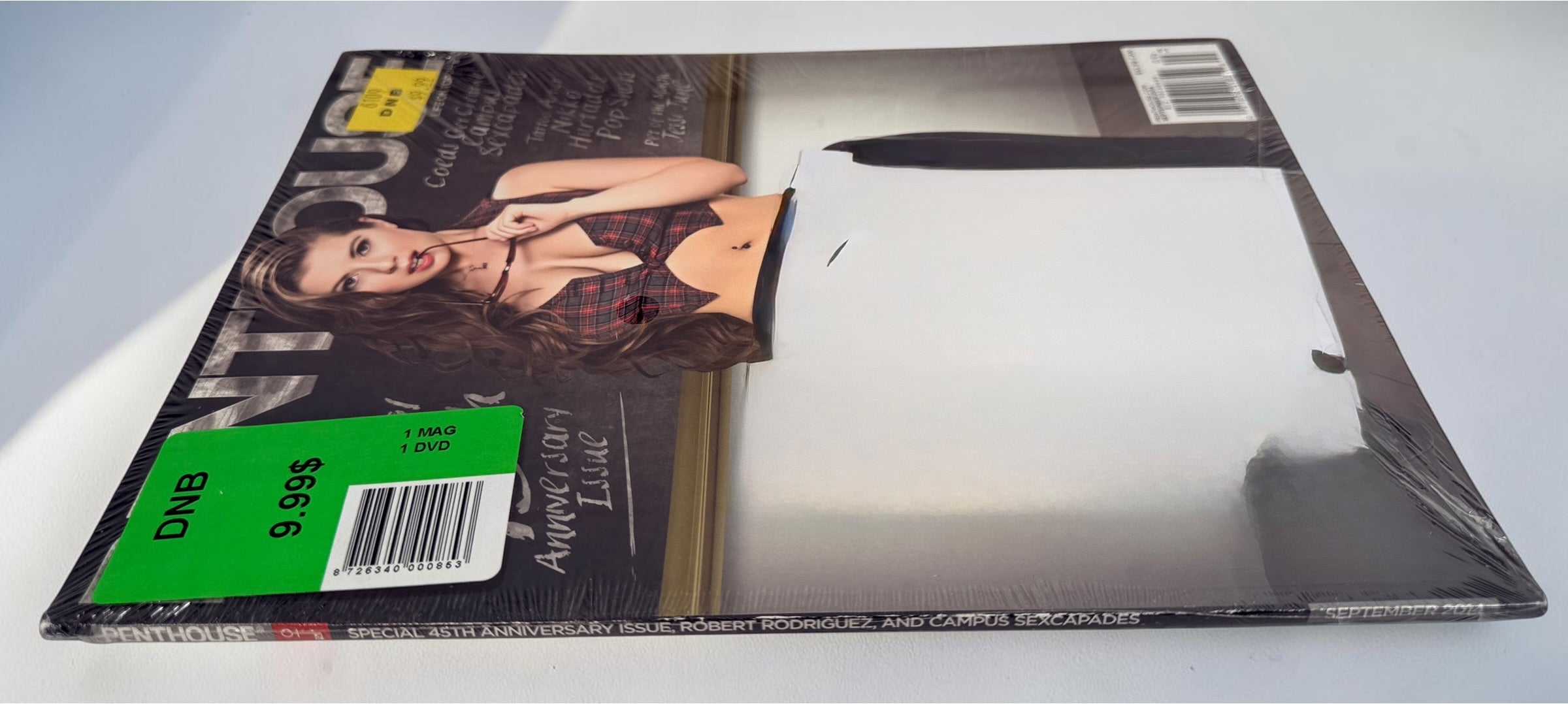 Sealed Penthouse September 2014 45th Anniversary magazine with original bonus DVD. Collectible unopened issue with original shrink wrap.