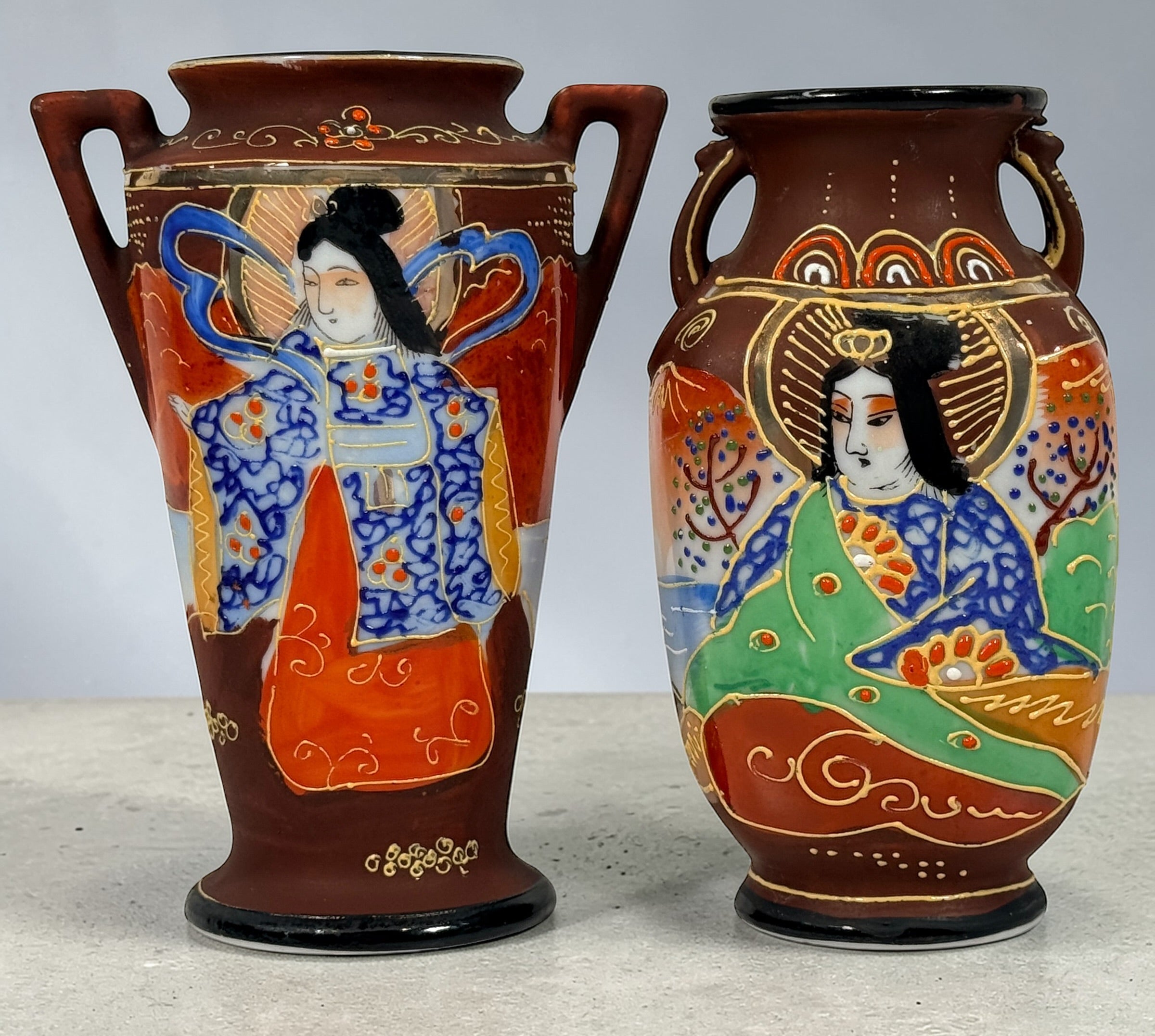 Vintage Japanese moriage geisha vase pair, 1920s–30s export ceramics with raised enamel detail. Decorative Asian décor collectible in good vintage condition.