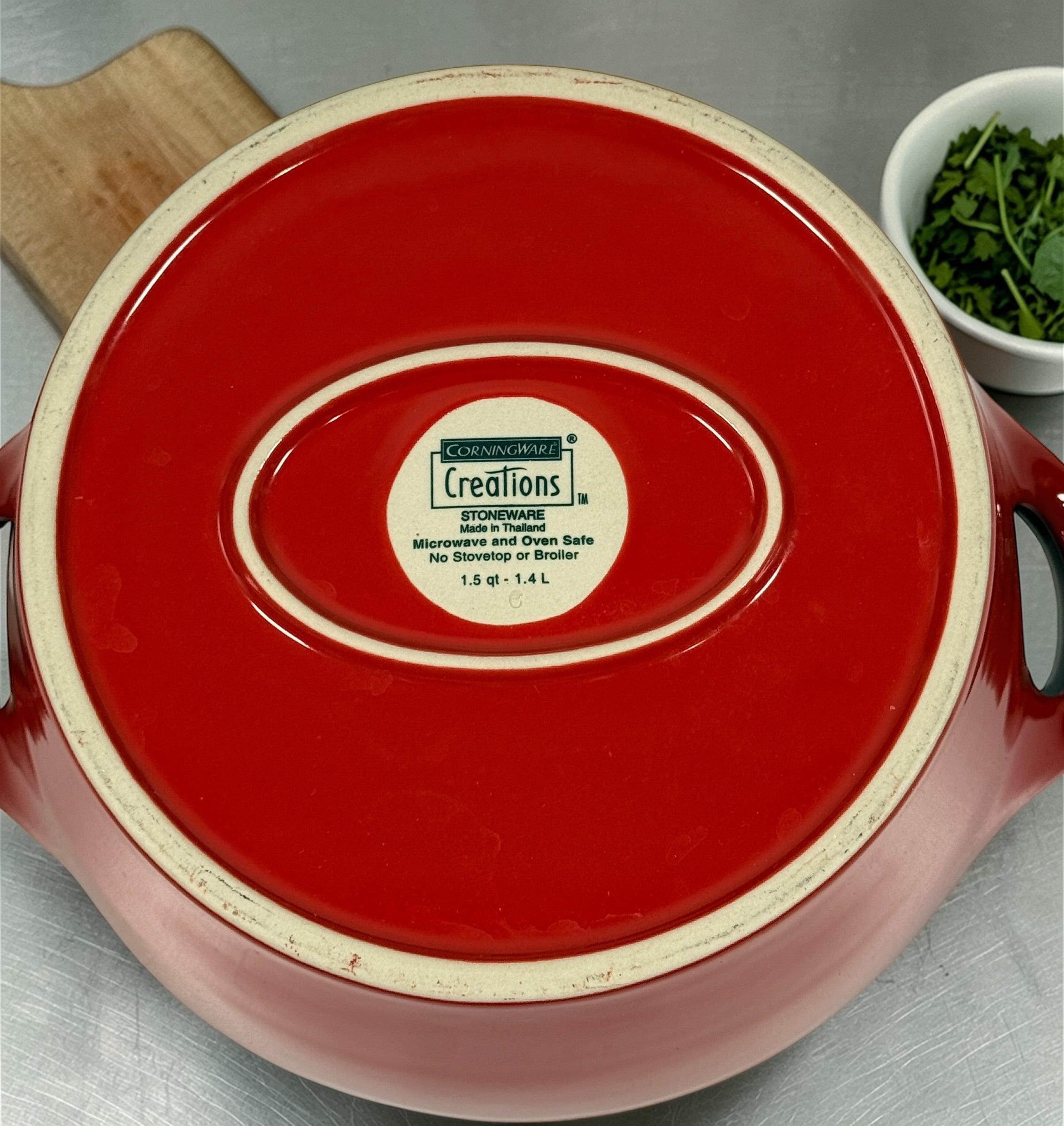 CorningWare Creations red covered casserole dish 1.5qt stoneware. Oven safe bakeware with lid, modern kitchen classic in very good condition.