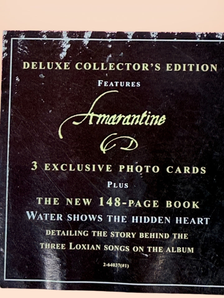 Sealed 2005 Enya Amarantine deluxe collector CD box set with book. Rare ambient Celtic music collectible in premium packaging for collectors.