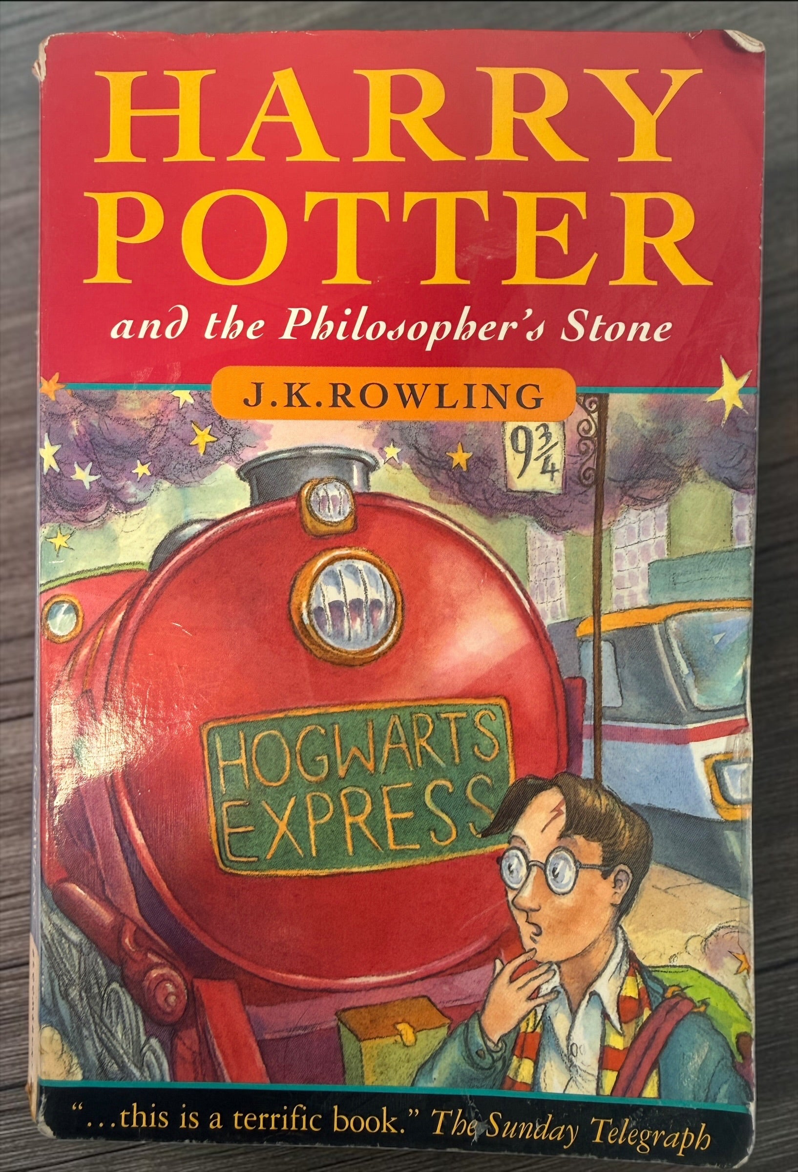 Harry Potter and the Philosopher’s Stone, Canadian third-printing paperback with Thomas Taylor cover art. Fair used condition. Shop Eco Depot Montreal.