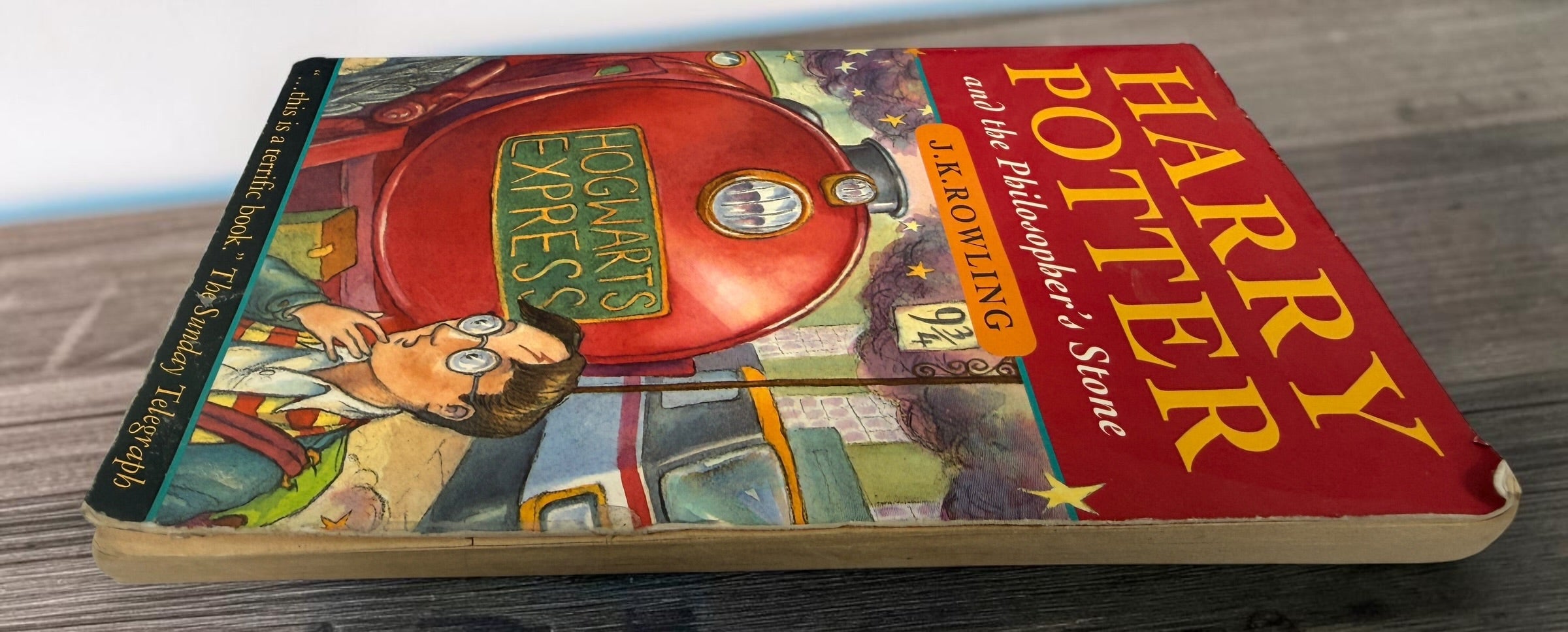 Harry Potter and the Philosopher’s Stone, Canadian third-printing paperback with Thomas Taylor cover art. Fair used condition. Shop Eco Depot Montreal.