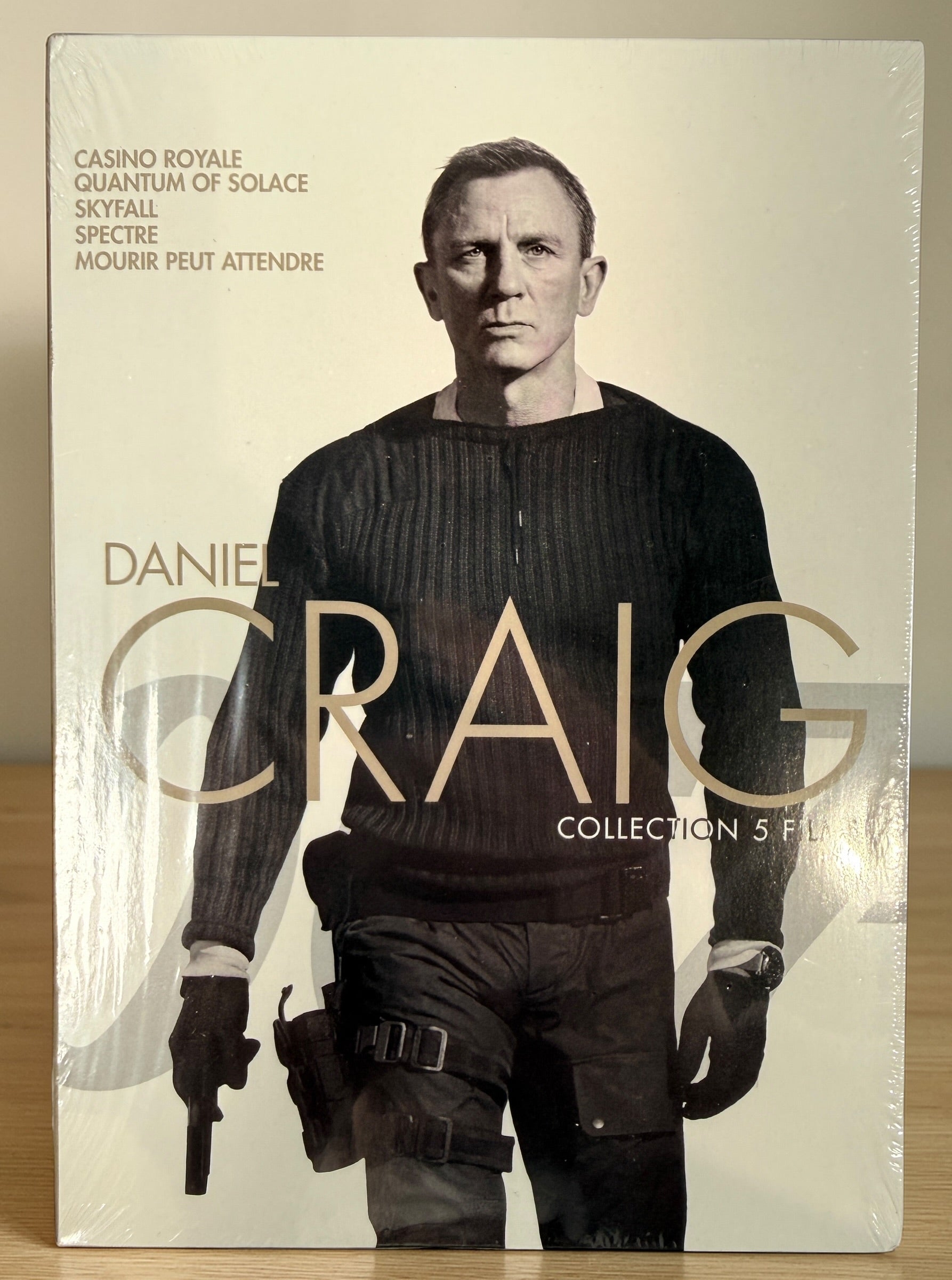James Bond Daniel Craig Collection 5 film DVD set including Casino Royale, Skyfall and Spectre. Factory sealed 007 movie box set for collectors and fans.