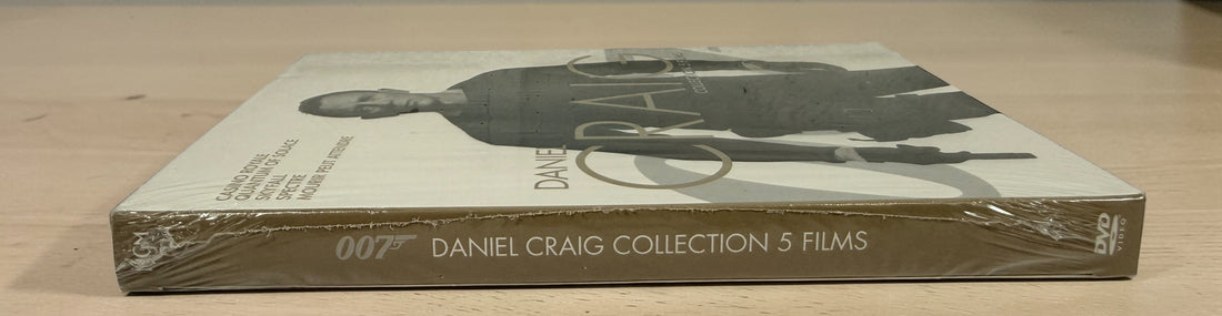 James Bond Daniel Craig Collection 5 film DVD set including Casino Royale, Skyfall and Spectre. Factory sealed 007 movie box set for collectors and fans.