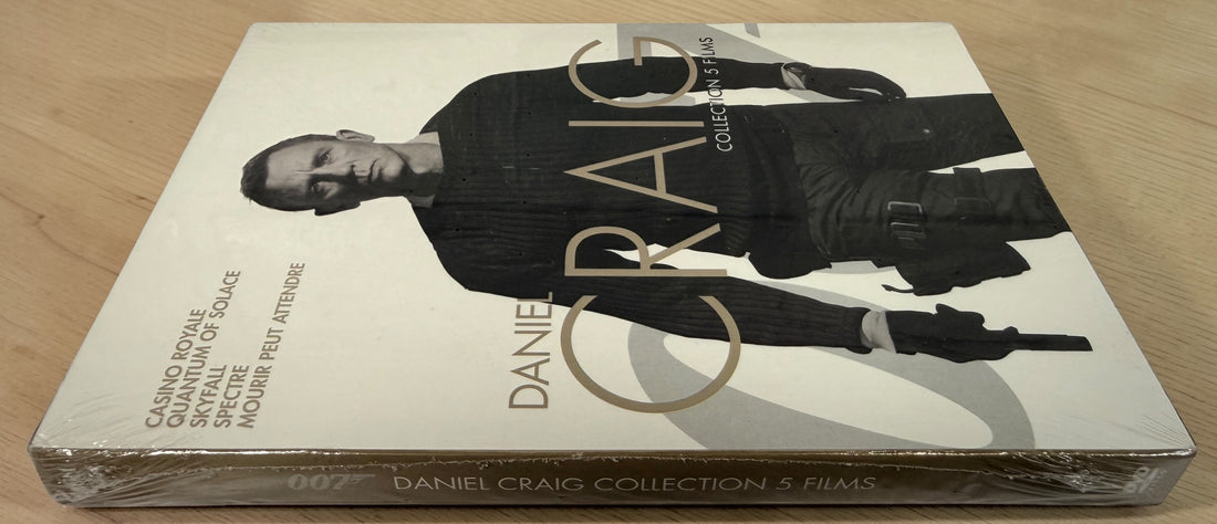 James Bond Daniel Craig Collection 5 film DVD set including Casino Royale, Skyfall and Spectre. Factory sealed 007 movie box set for collectors and fans.