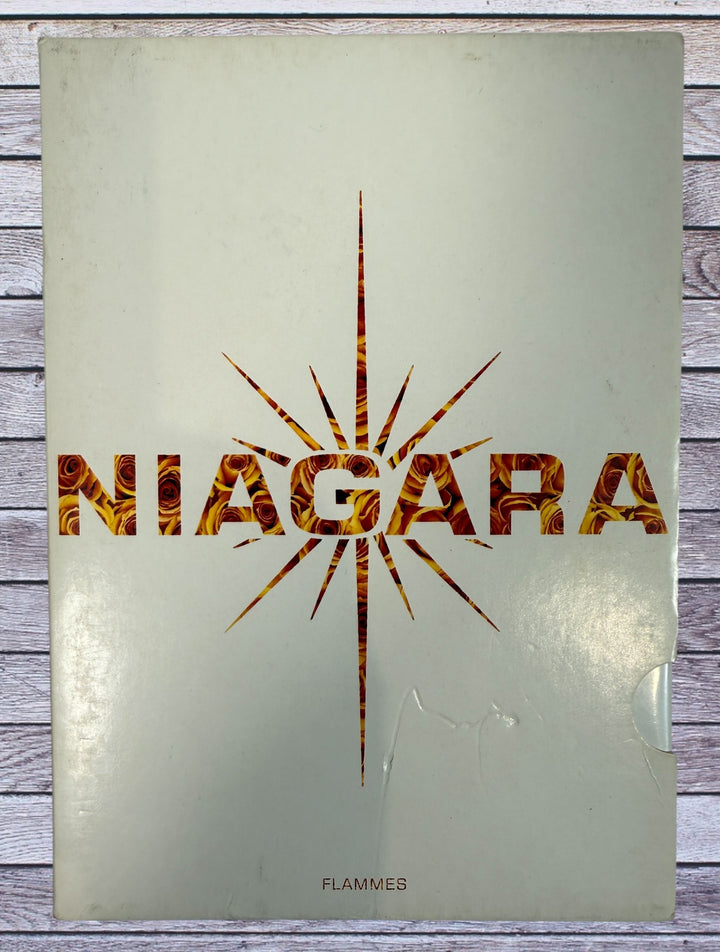 Niagara Flammes 2002 DVD featuring remastered videoclips, documentary and bonus content. PAL format French release with original insert included.