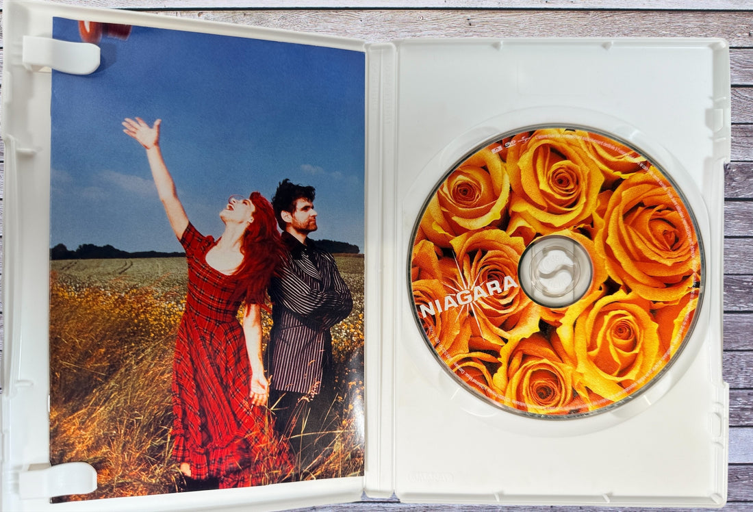 Niagara Flammes 2002 DVD featuring remastered videoclips, documentary and bonus content. PAL format French release with original insert included.