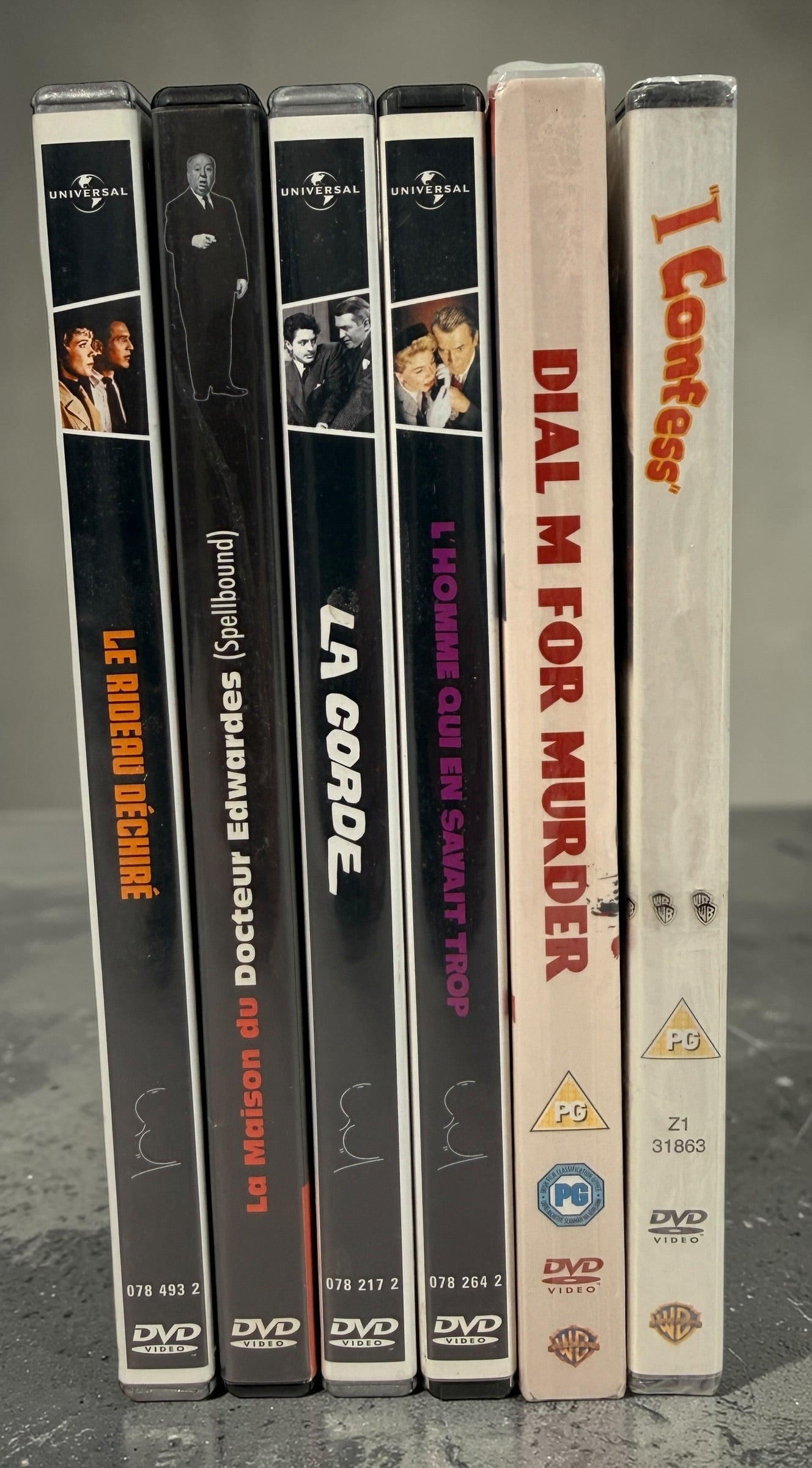 Six Alfred Hitchcock classics on DVD including Rope, Dial M for Murder, Spellbound and Torn Curtain. Universal Hitchcock Collection releases in good condition.