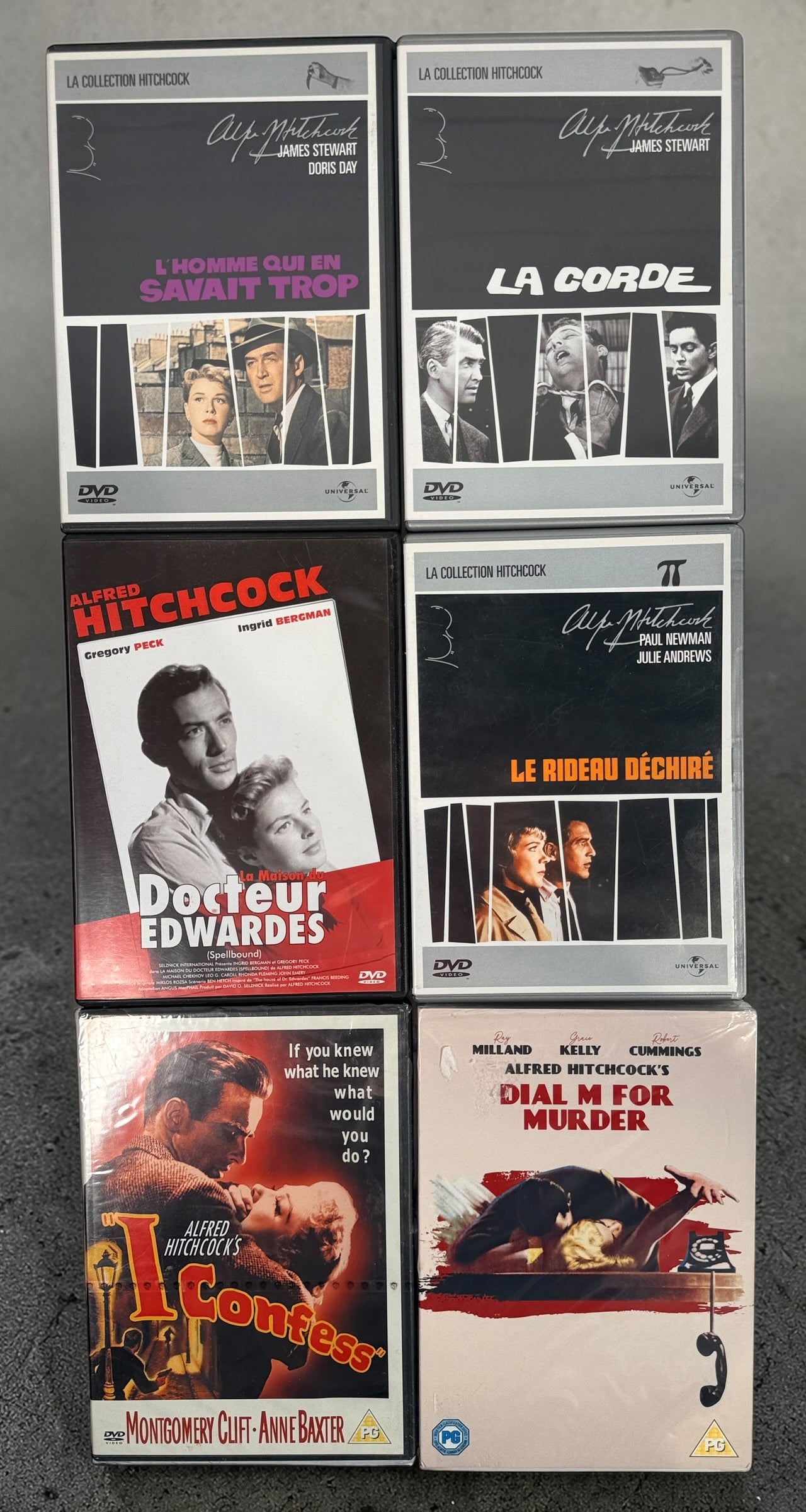 Six Alfred Hitchcock classics on DVD including Rope, Dial M for Murder, Spellbound and Torn Curtain. Universal Hitchcock Collection releases in good condition.