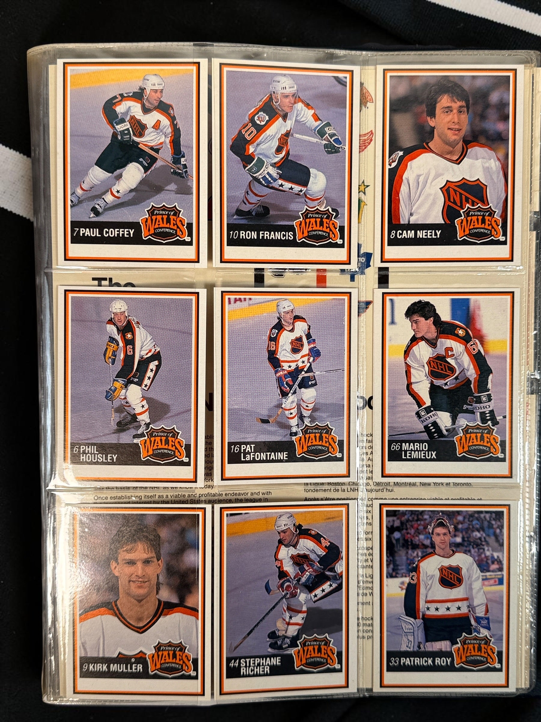 Complete 1990-91 Kraft NHL 112-card hockey set with vintage binder and bilingual inserts. Features Lemieux, Roy, Sakic, Bourque, Coffey and more.