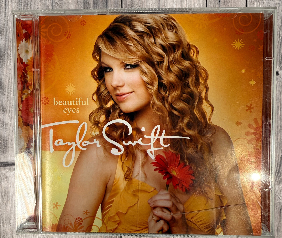 2008 Taylor Swift Beautiful Eyes CD and DVD set. Early limited release featuring exclusive tracks and official music videos. Complete 2-disc collectible.