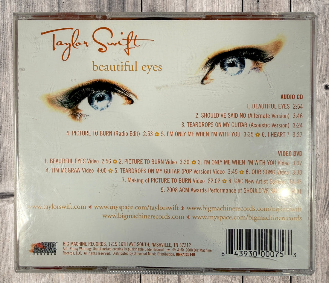 2008 Taylor Swift Beautiful Eyes CD and DVD set. Early limited release featuring exclusive tracks and official music videos. Complete 2-disc collectible.