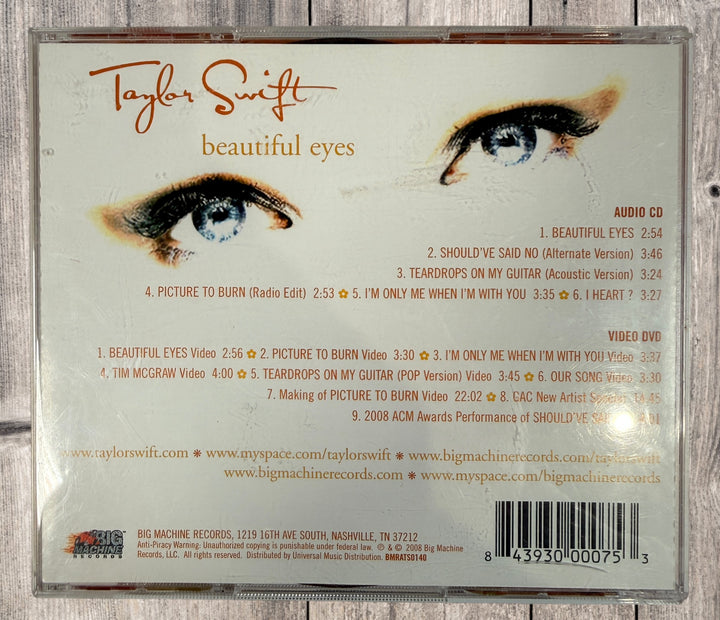 2008 Taylor Swift Beautiful Eyes CD and DVD set. Early limited release featuring exclusive tracks and official music videos. Complete 2-disc collectible.