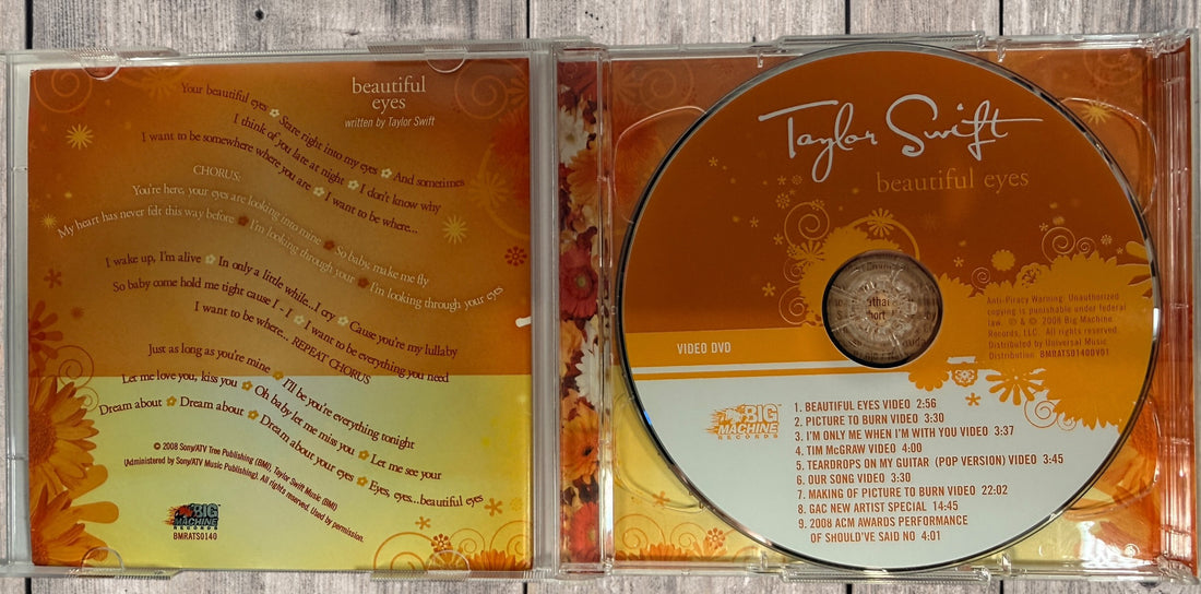 2008 Taylor Swift Beautiful Eyes CD and DVD set. Early limited release featuring exclusive tracks and official music videos. Complete 2-disc collectible.